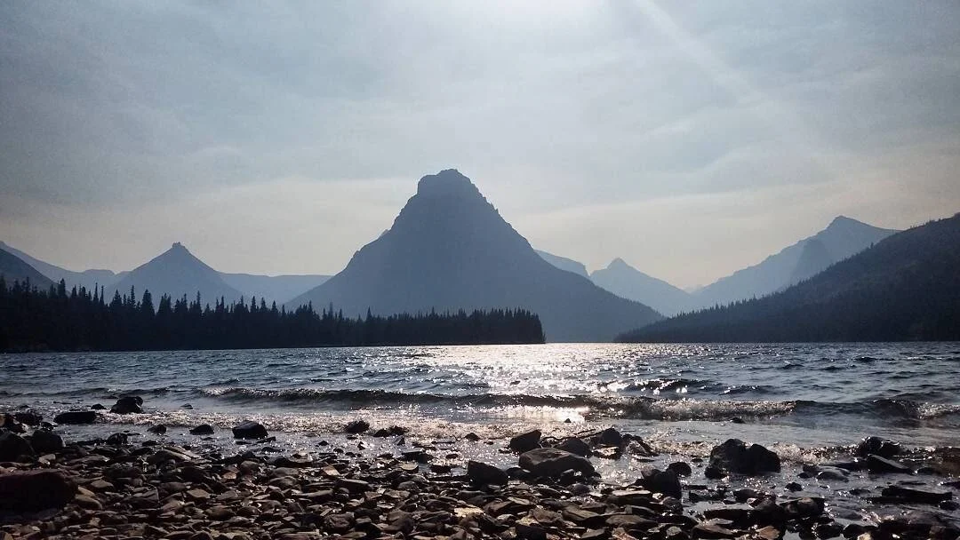 Example: Sinopah Mountain watching over Two Medicine Lake, Blackfeet Nation.