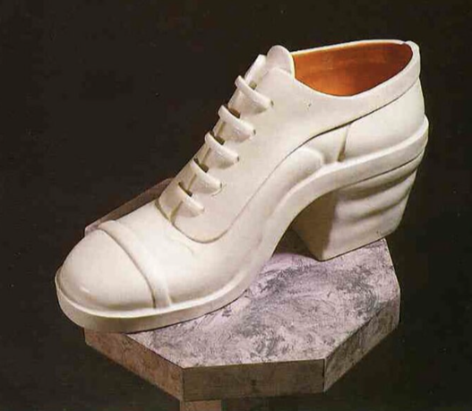 SHOE, 1985 
Glazed porcelain, 9”x 15.5” x 5.5″
