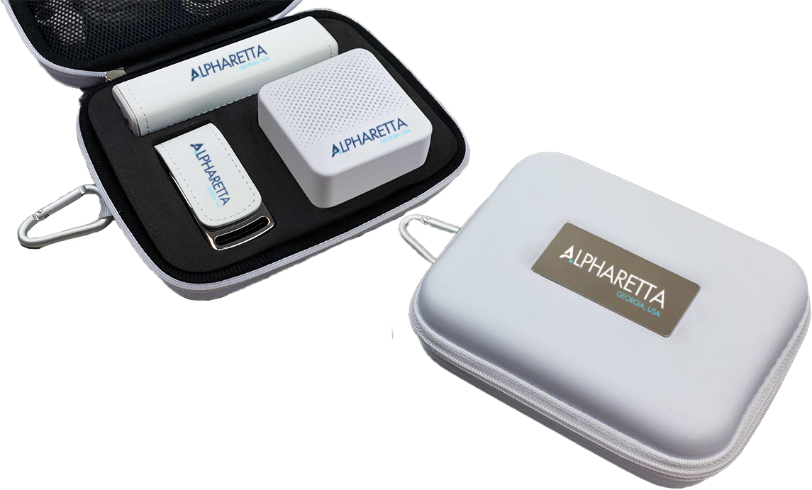 Portable medical or diagnostic device case with a branded logo, containing cylindrical, rectangular, and square components, and an additional closed protective case with a zipper, all labeled with 'AlphaRetta' and 'Georgia USA'.