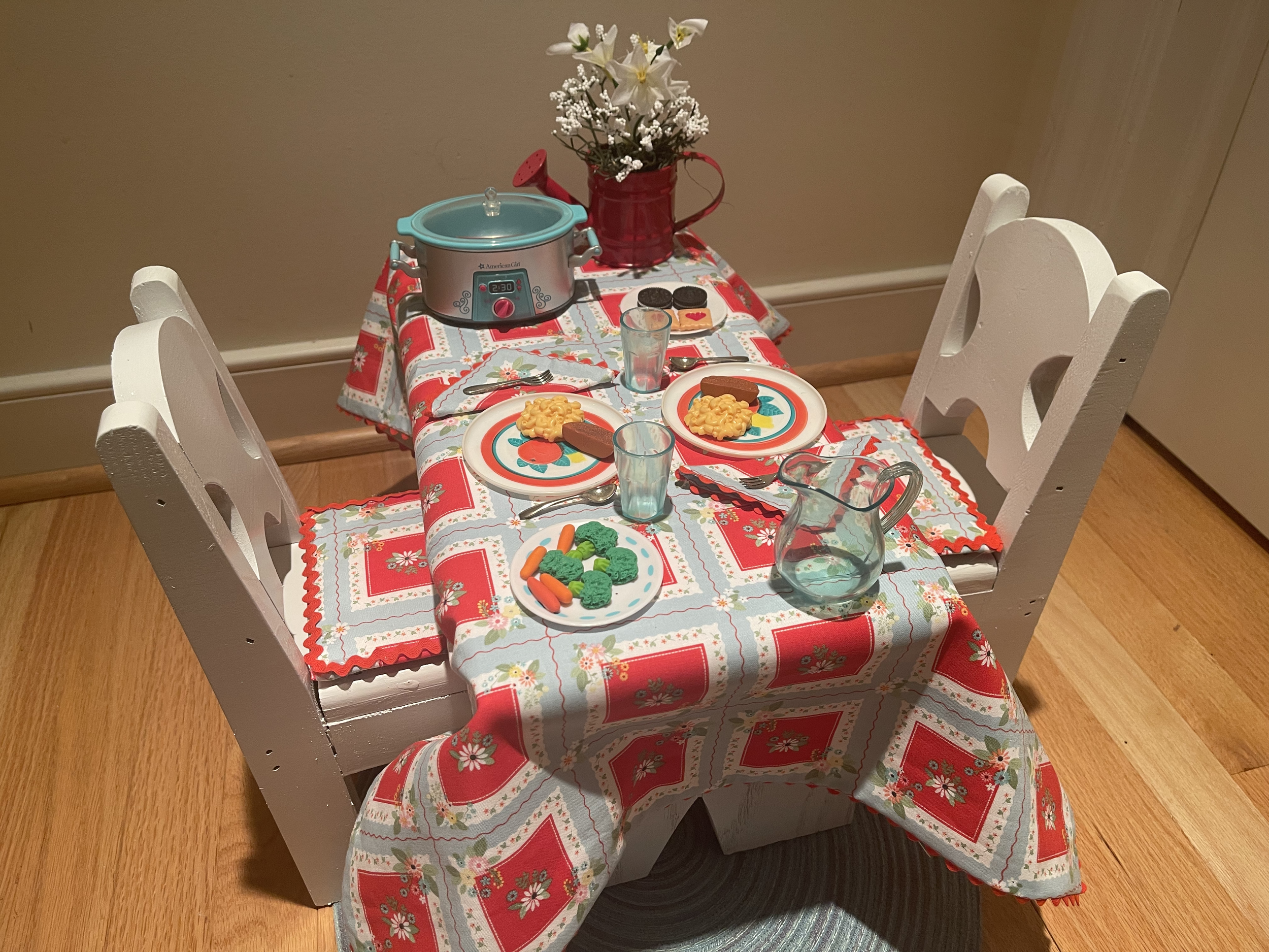 This rustic table features a crockpot meal and all necessary accessories for a wholesome meal. $82