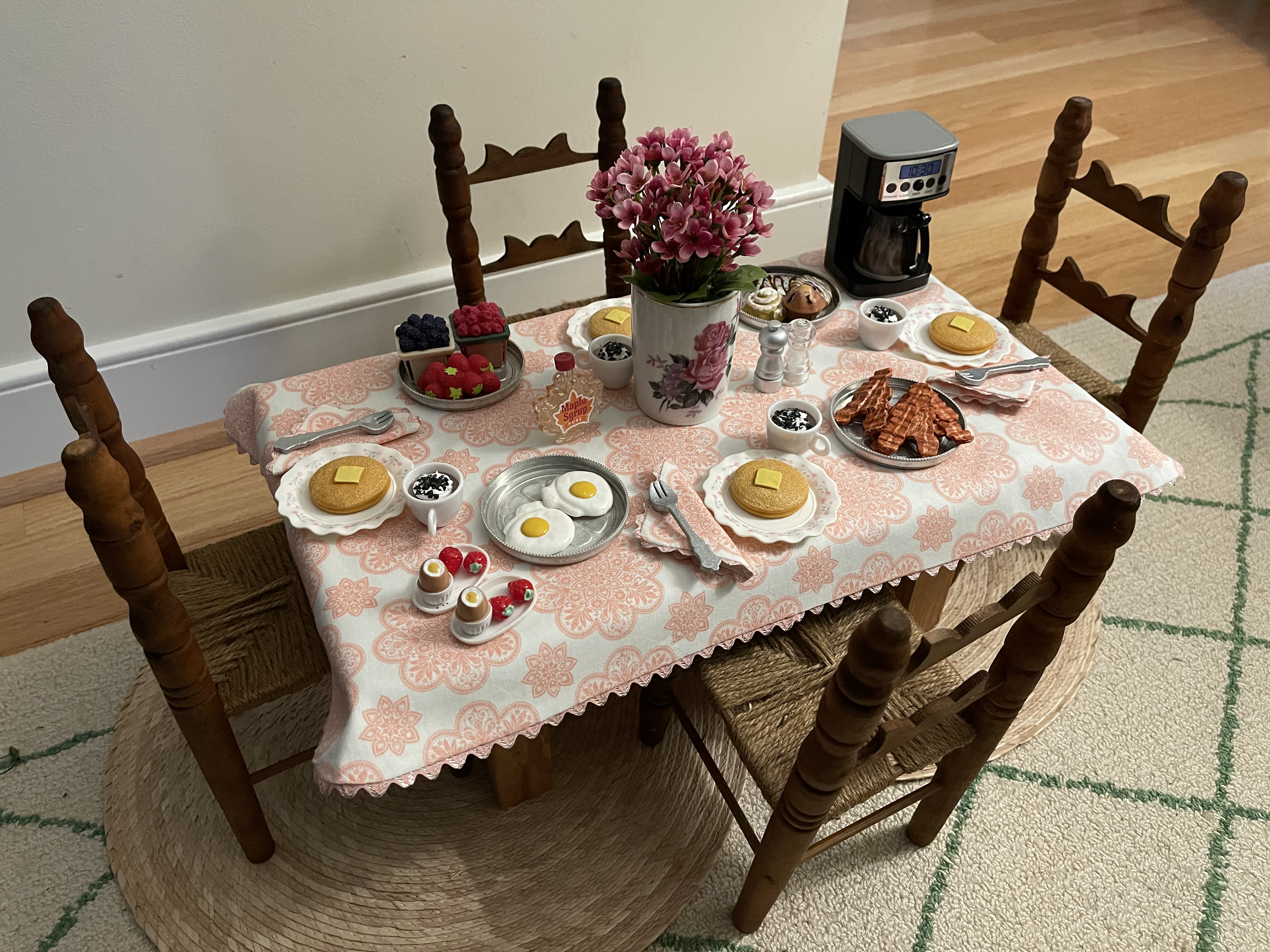 This table features complete breakfast for 4, including a coffee maker. The chairs are vintage rustic and are in perfect shape. $112