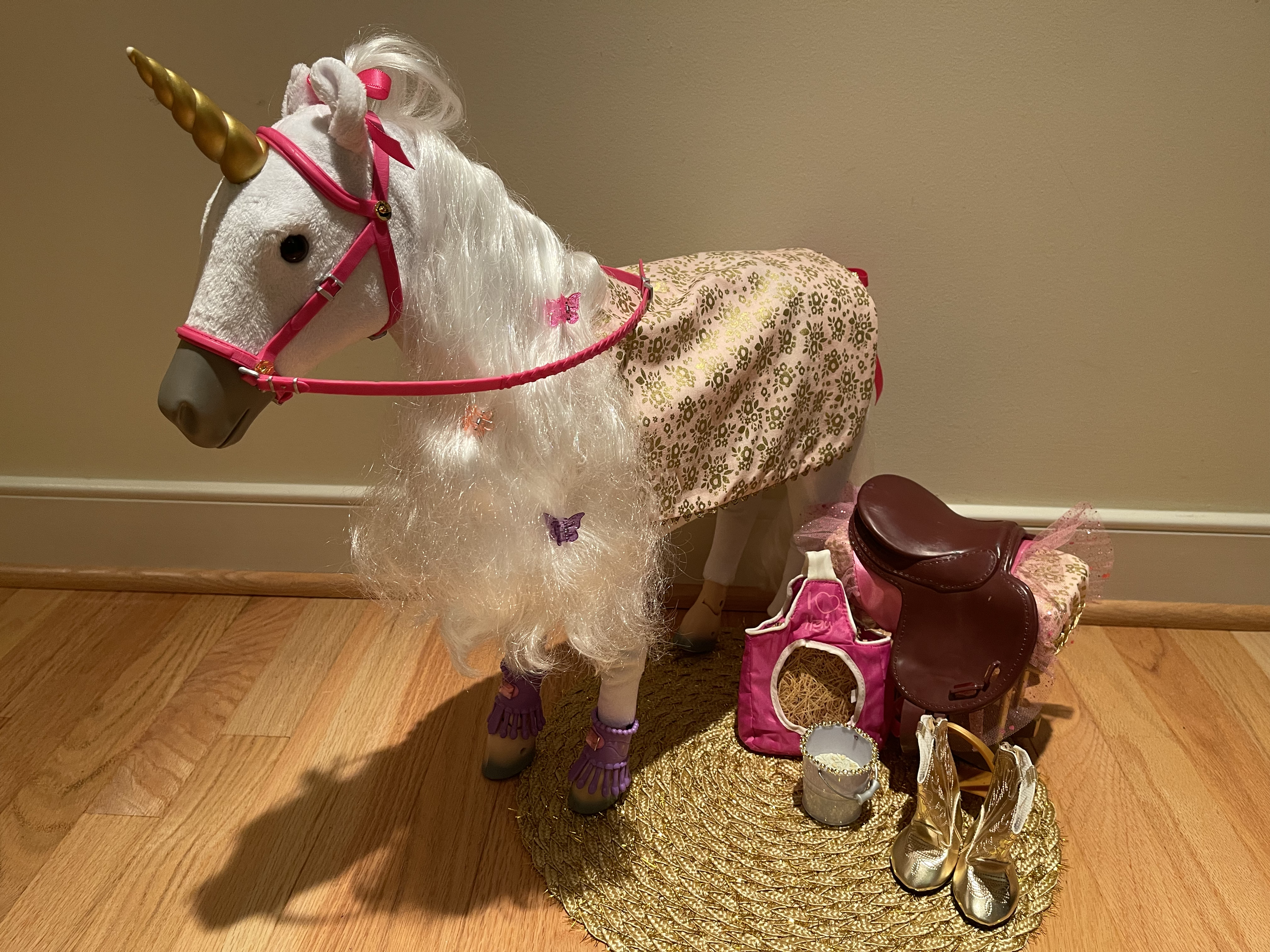 Unicorn 1 This up-cycled unicorn is in perfect shape! the set includes a blanket, saddle, saddle stand, hay, food, boots for 18" doll. $82