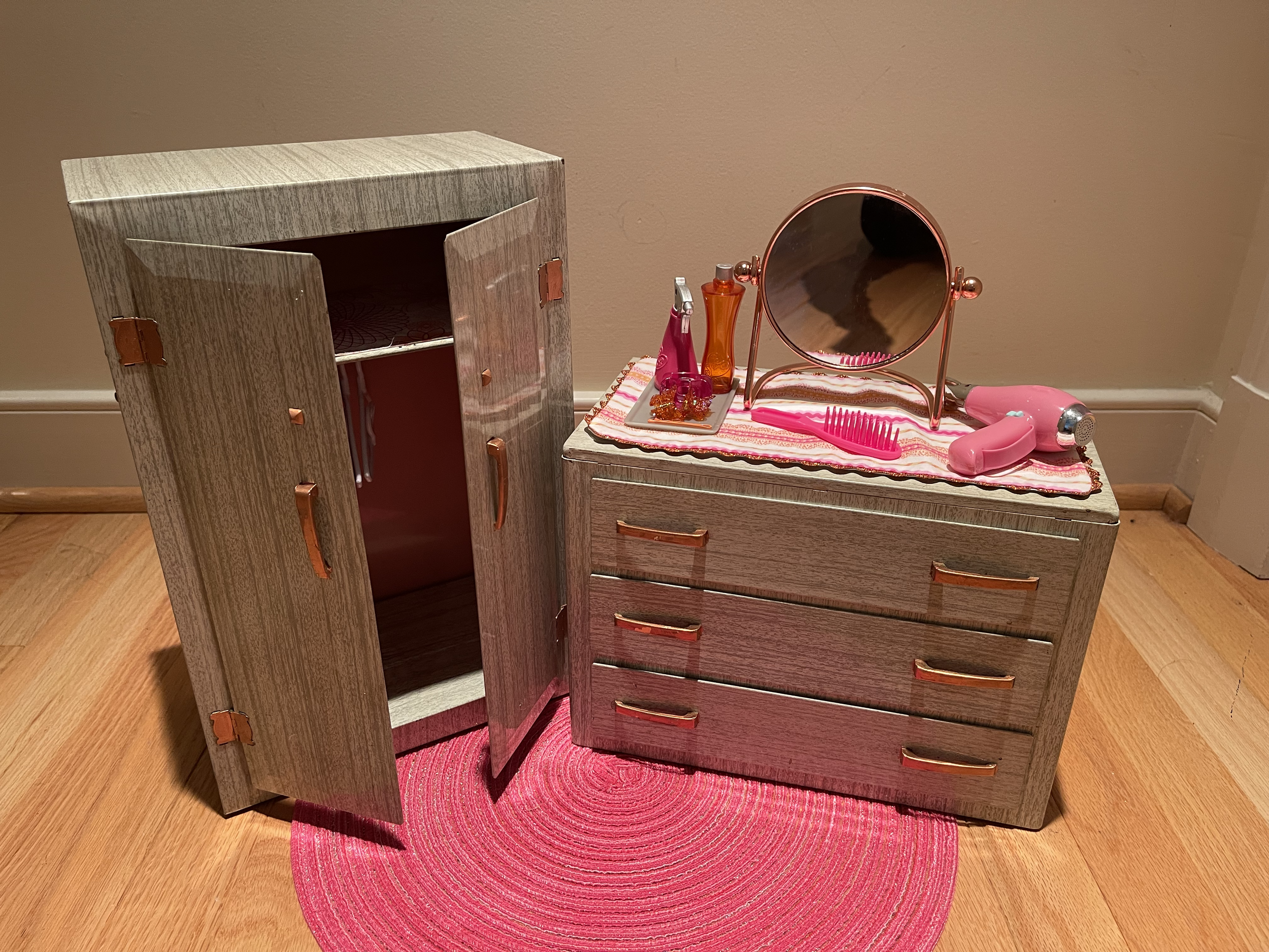 This vintage dresser and wardrobe are in great shape. They are gray metal and feature some hangers and some beauty supplies. Drawers are lined. $68