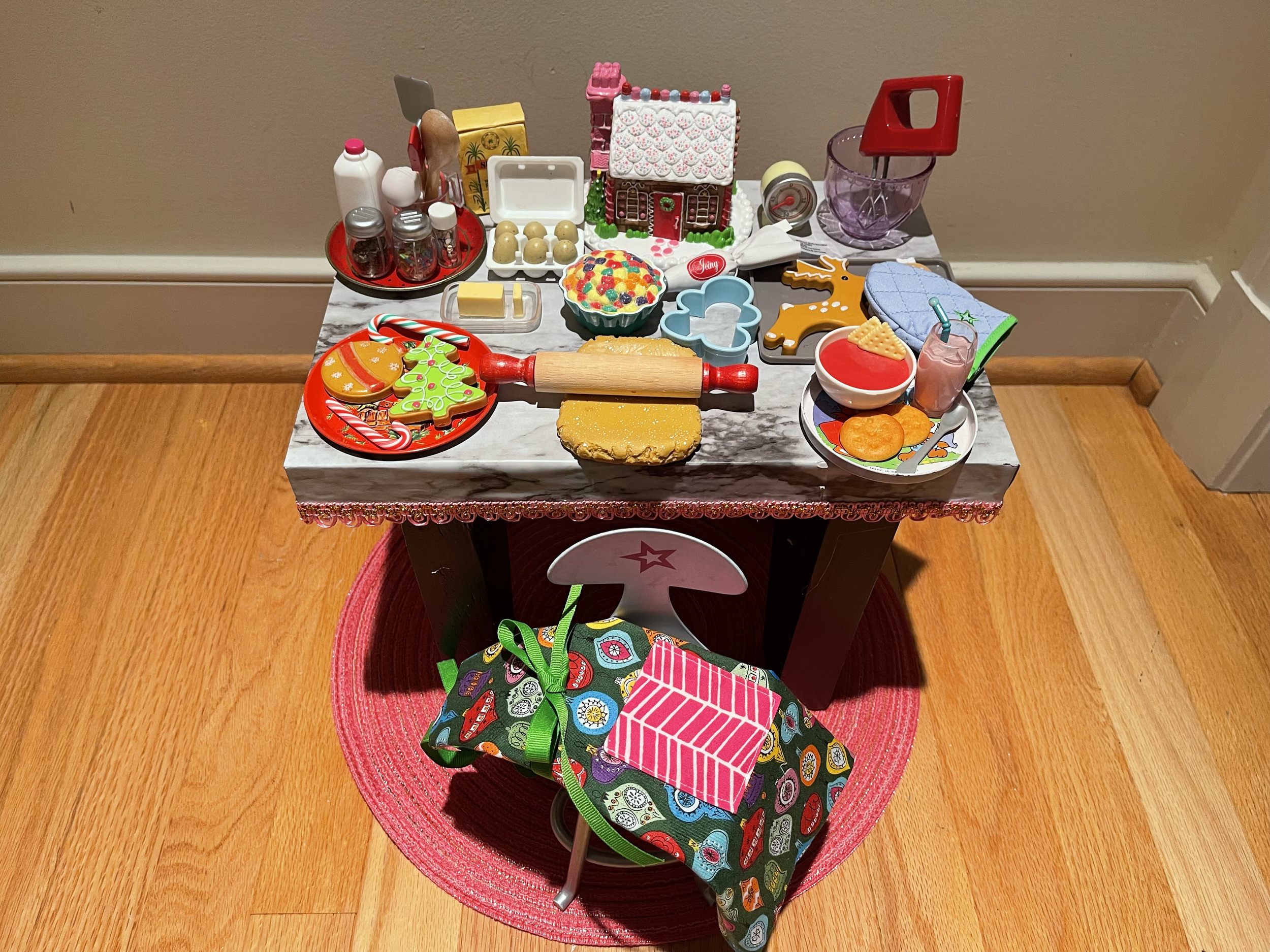 This baking table features a lot of vintage American Girl accessories. It also includes a stool, apron and lunch! $82