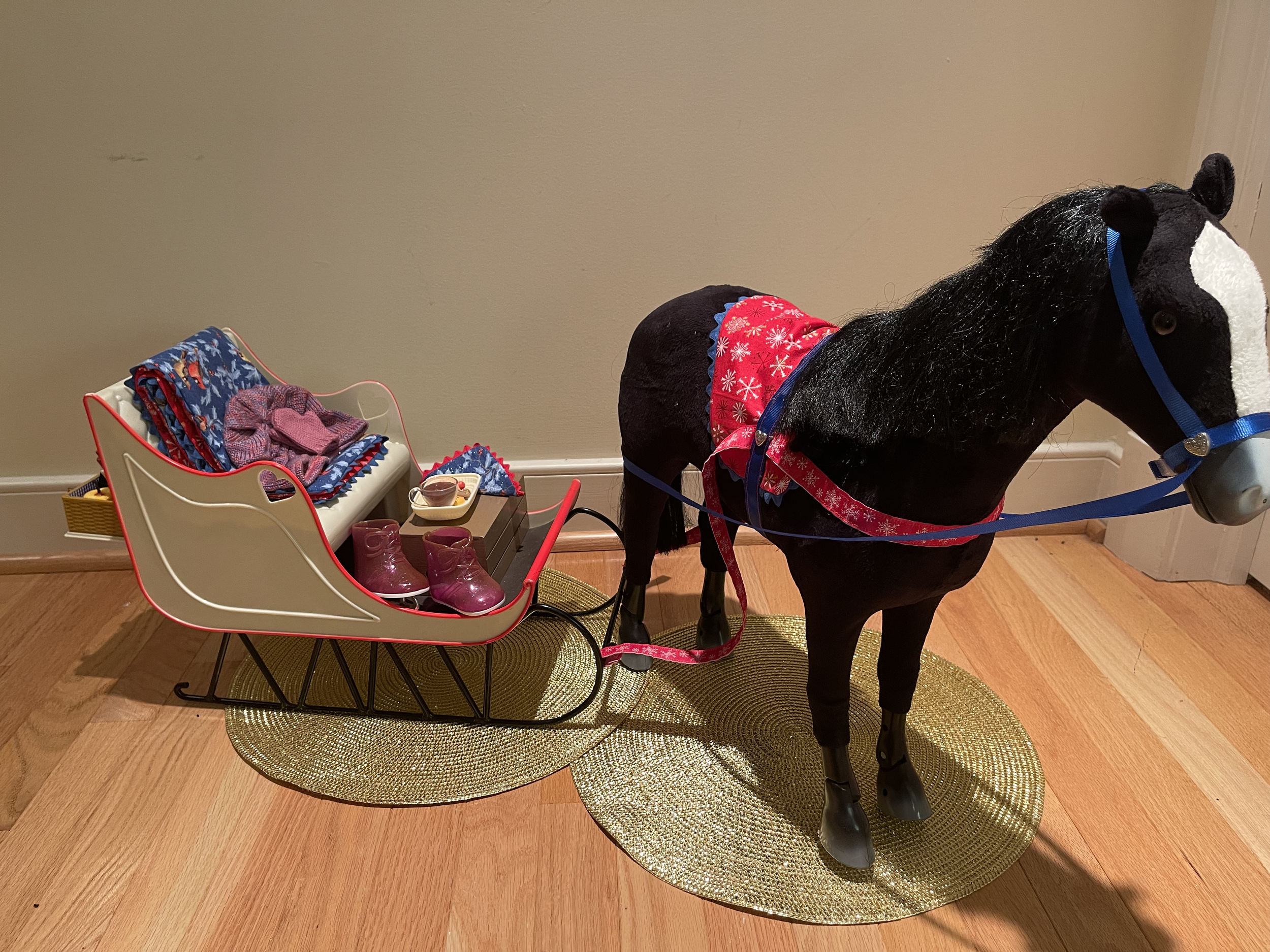 Winter Sleigh 1 features blanket, horse accessories, snack, skates, hat and gloves. $124