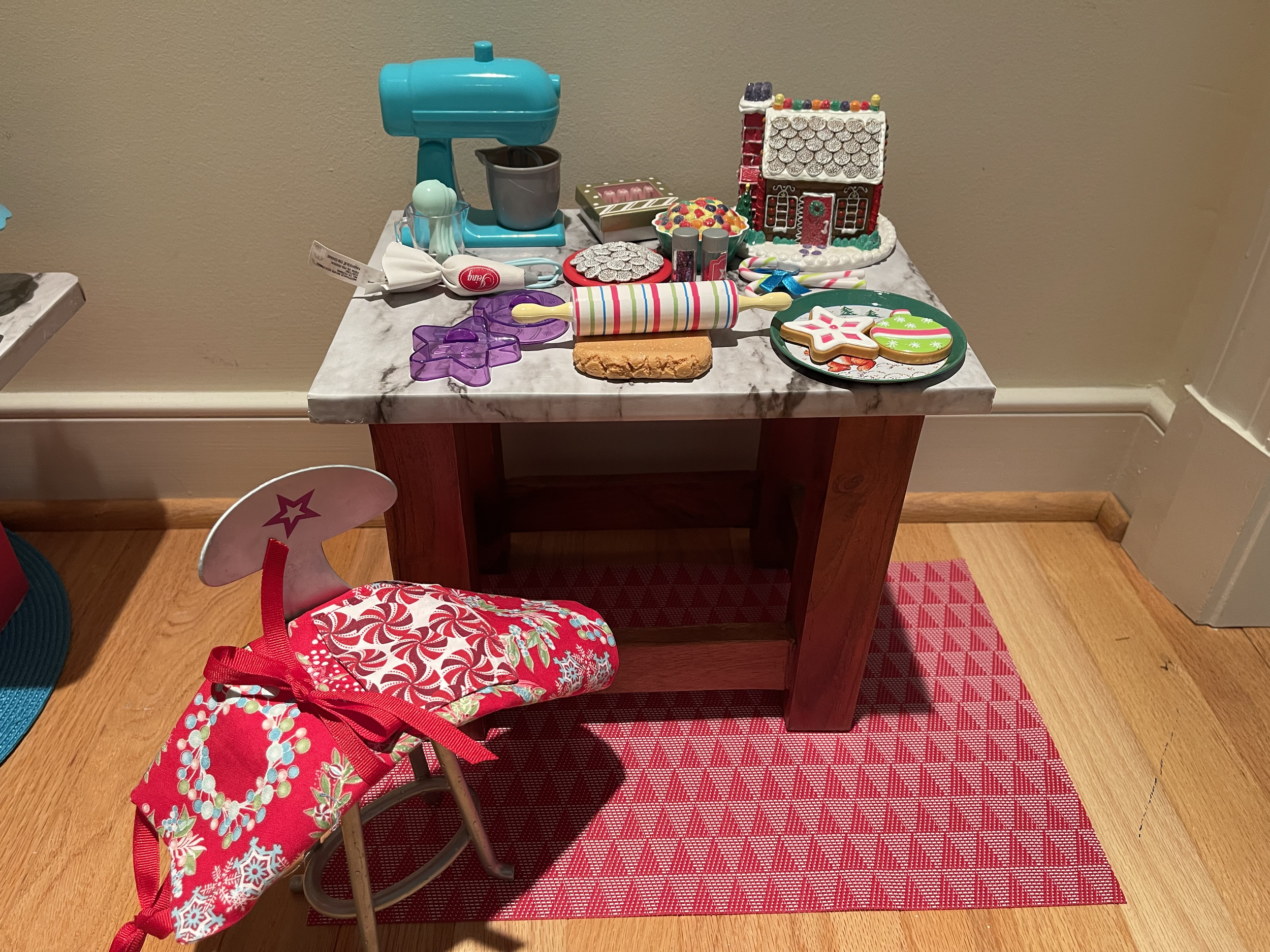 Holiday baking set includes gingerbread house and holiday cookies. $82