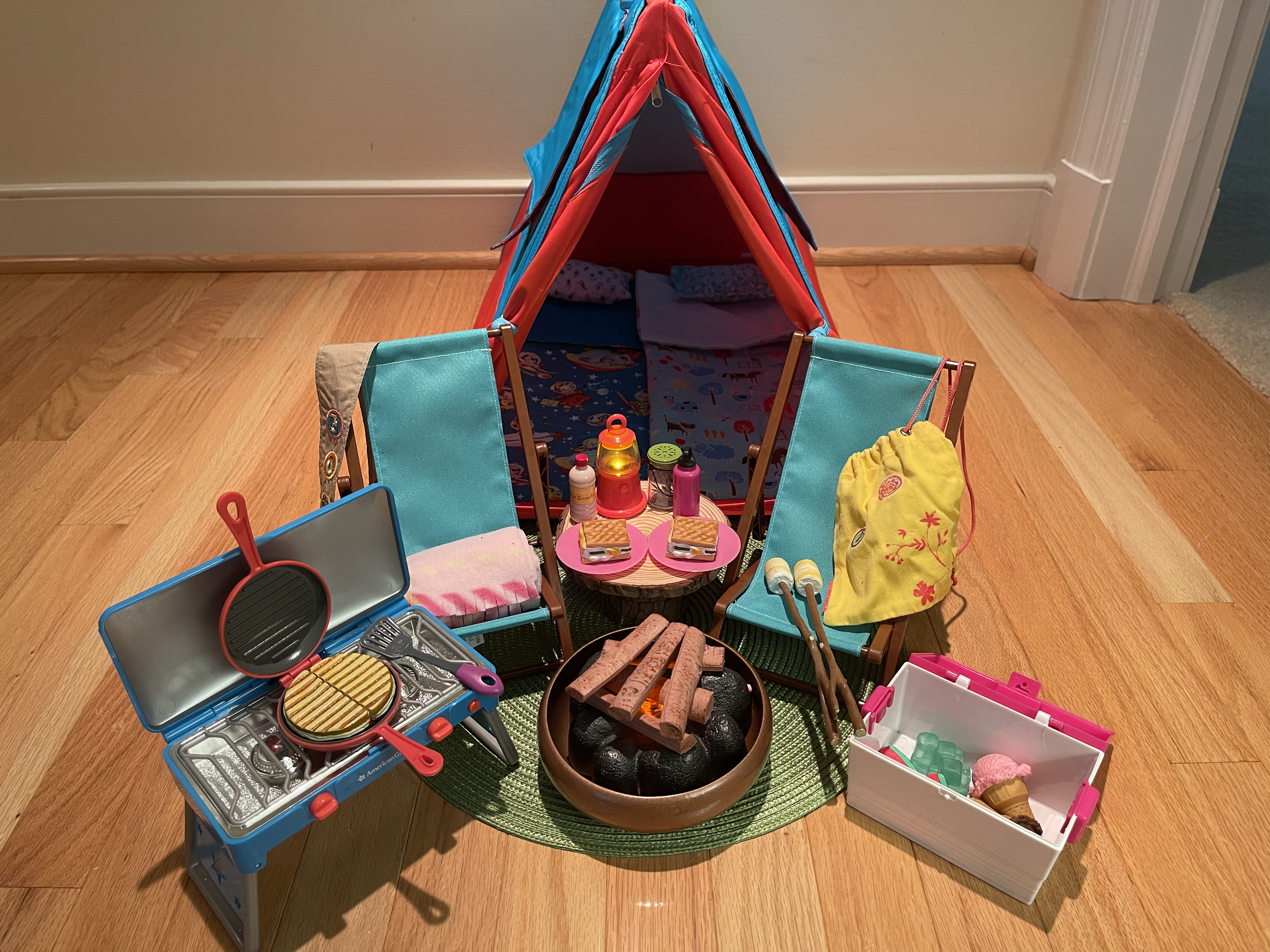 Camping Set 1 features 2 sleeping bags, light up lantern, light up camp fire, grill, cooler, and more! $96