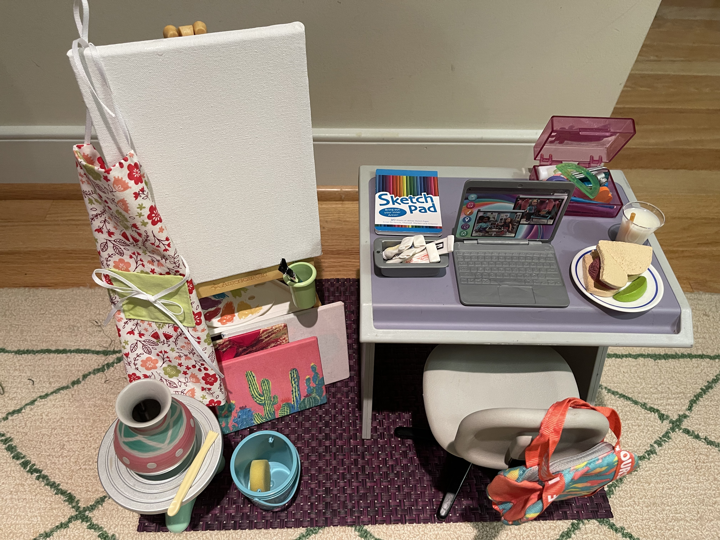Fun art set includes lots of supplies, canvases, potter's when, a snack, backpack, and more. $80