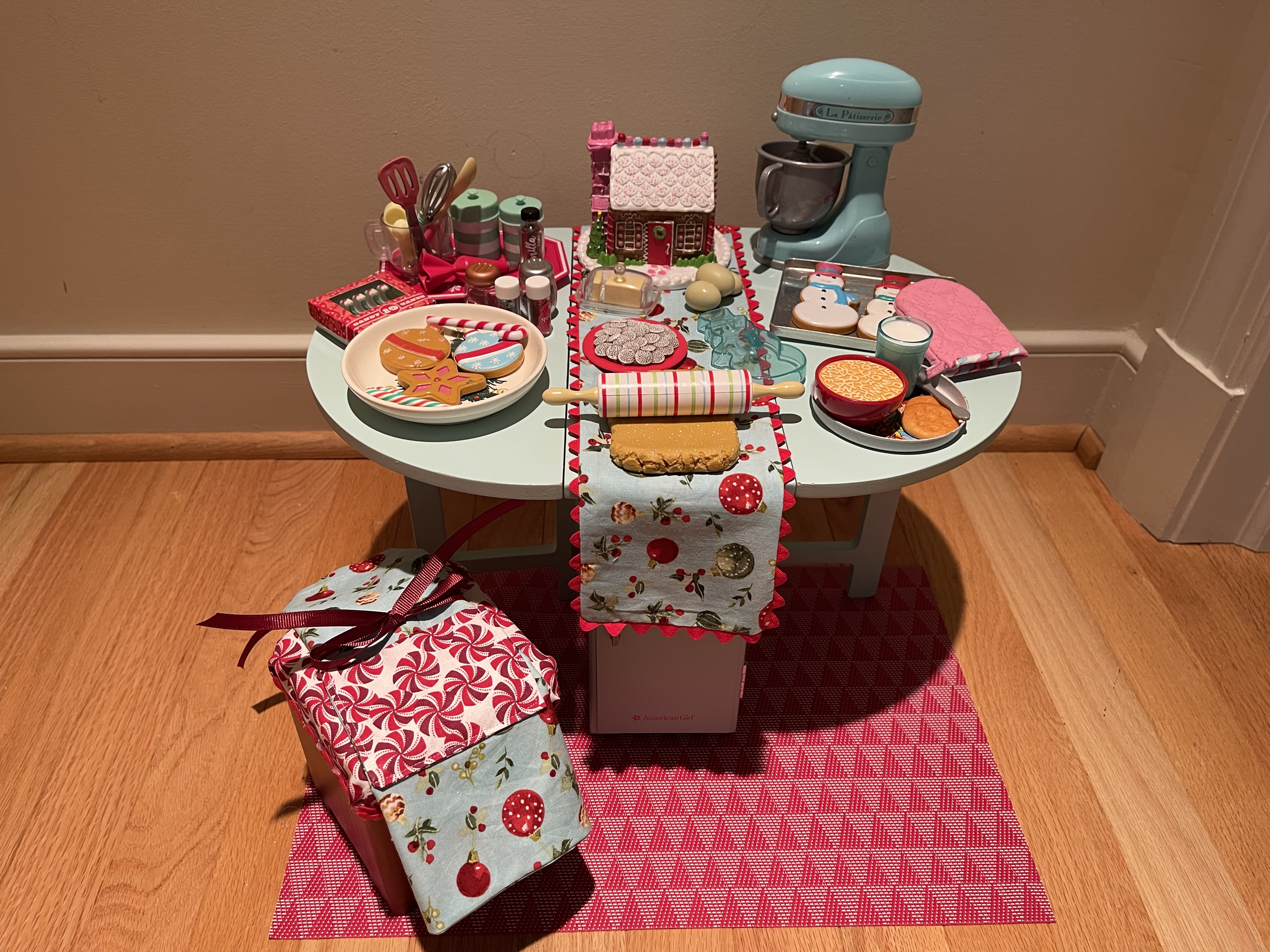 This baking table features a lot of vintage American Girl accessories. It also includes a stool, apron and lunch! $92