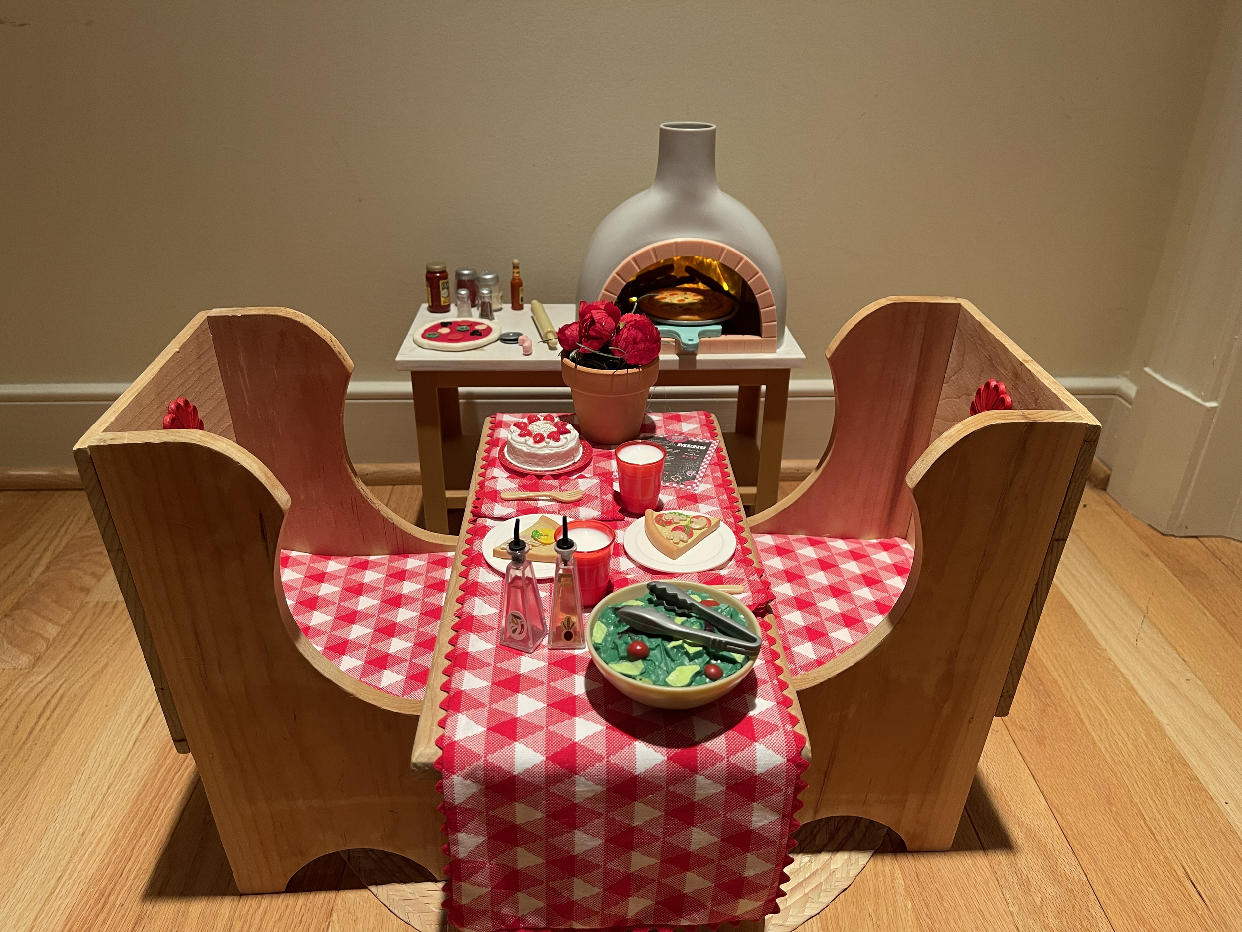 PIZZA PARLOR 2: Pizza oven lights up and includes lots of fun cooking accessories. The dining table has everything needed for a fun meal. $98