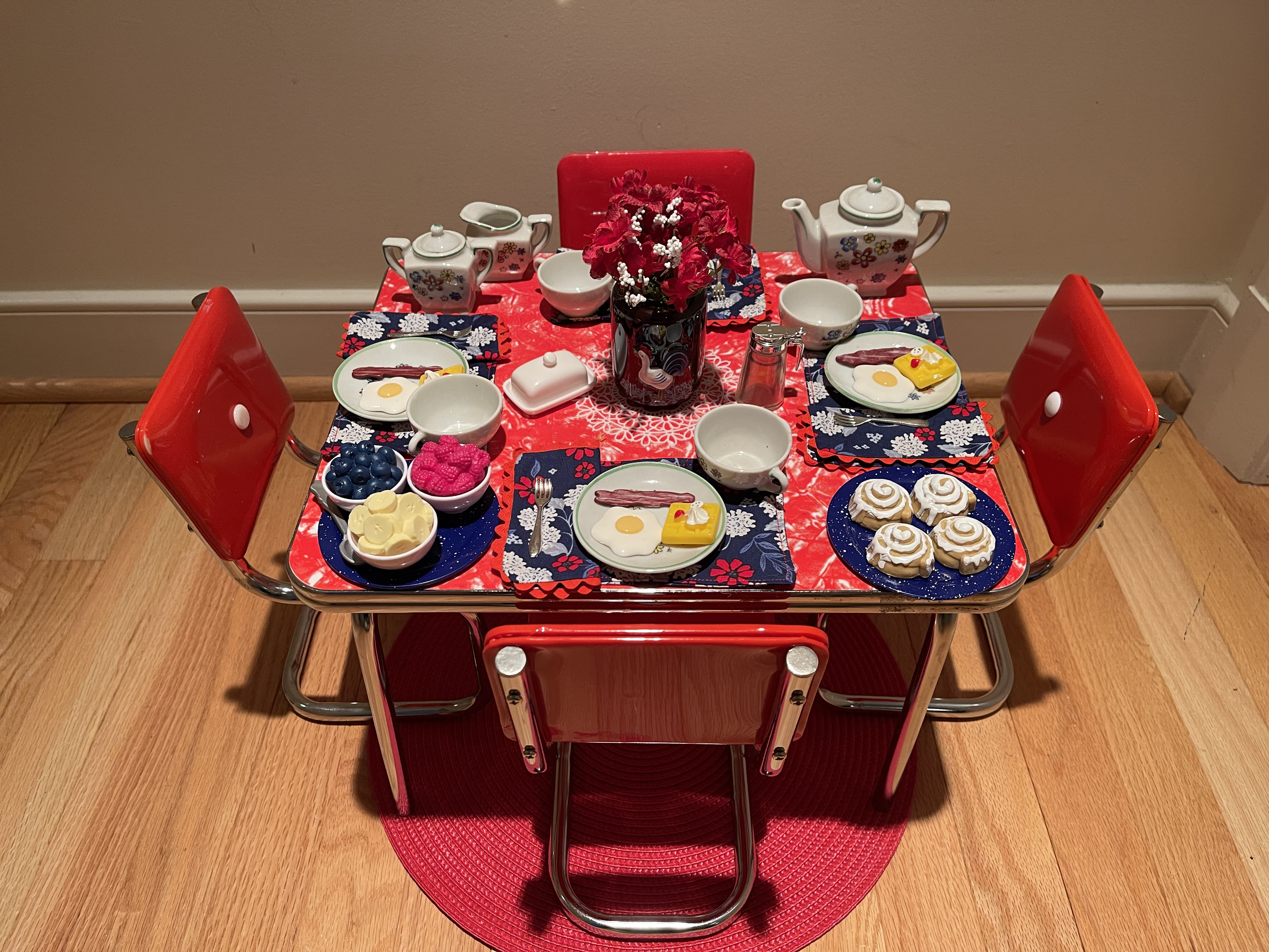 This up-cycled American Girl table features 2 additional chairs, complete breakfast for four and china dishes with matching tea set. $132