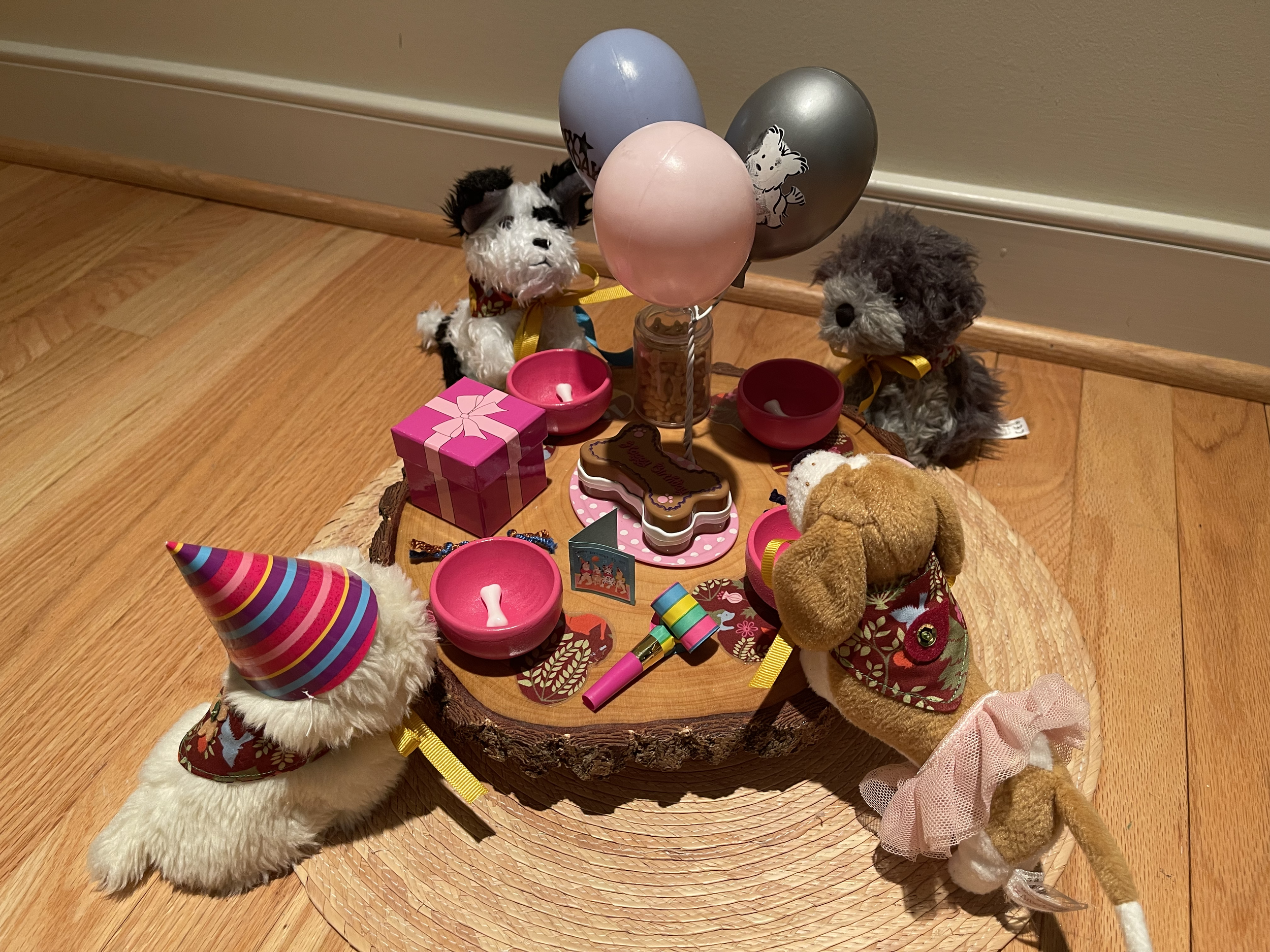 Dog Party 2 features 4 discontinued AG dogs. Included are a cake, water bowl, dog bone-shaped placemats, gifts, snacks, and balloons. $80