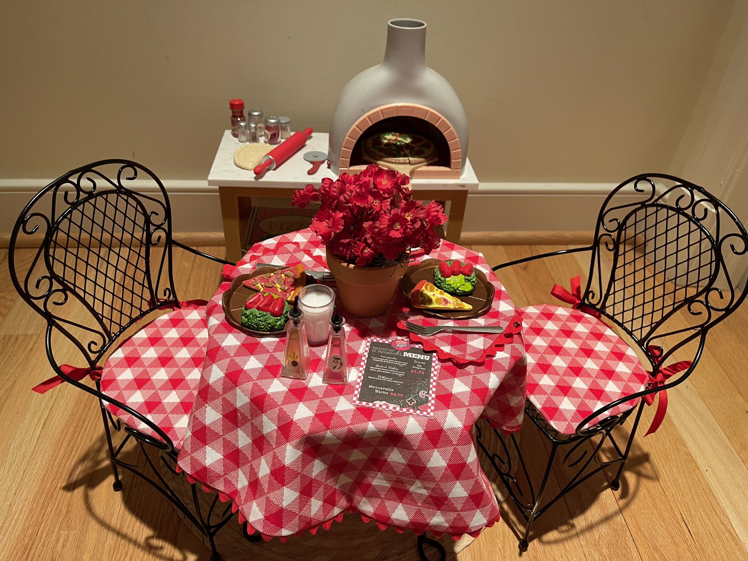 PIZZA PARLOR 3: Pizza oven lights up and includes lots of fun cooking accessories. The dining table has everything needed for a fun meal. $98