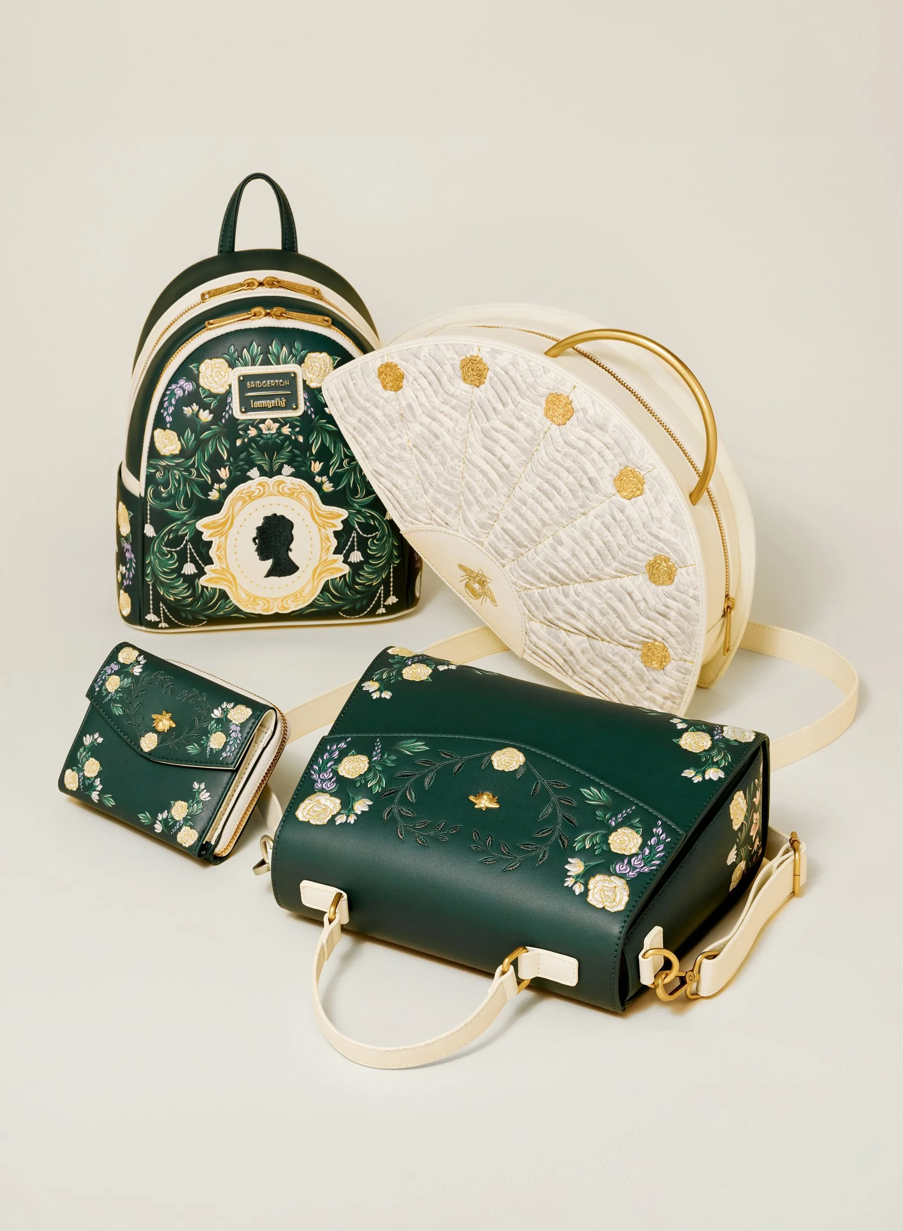 Image of purses and bags on plain background from Bridgerton x Loungefly limited edition collection illustrated by Maggie Enterrios