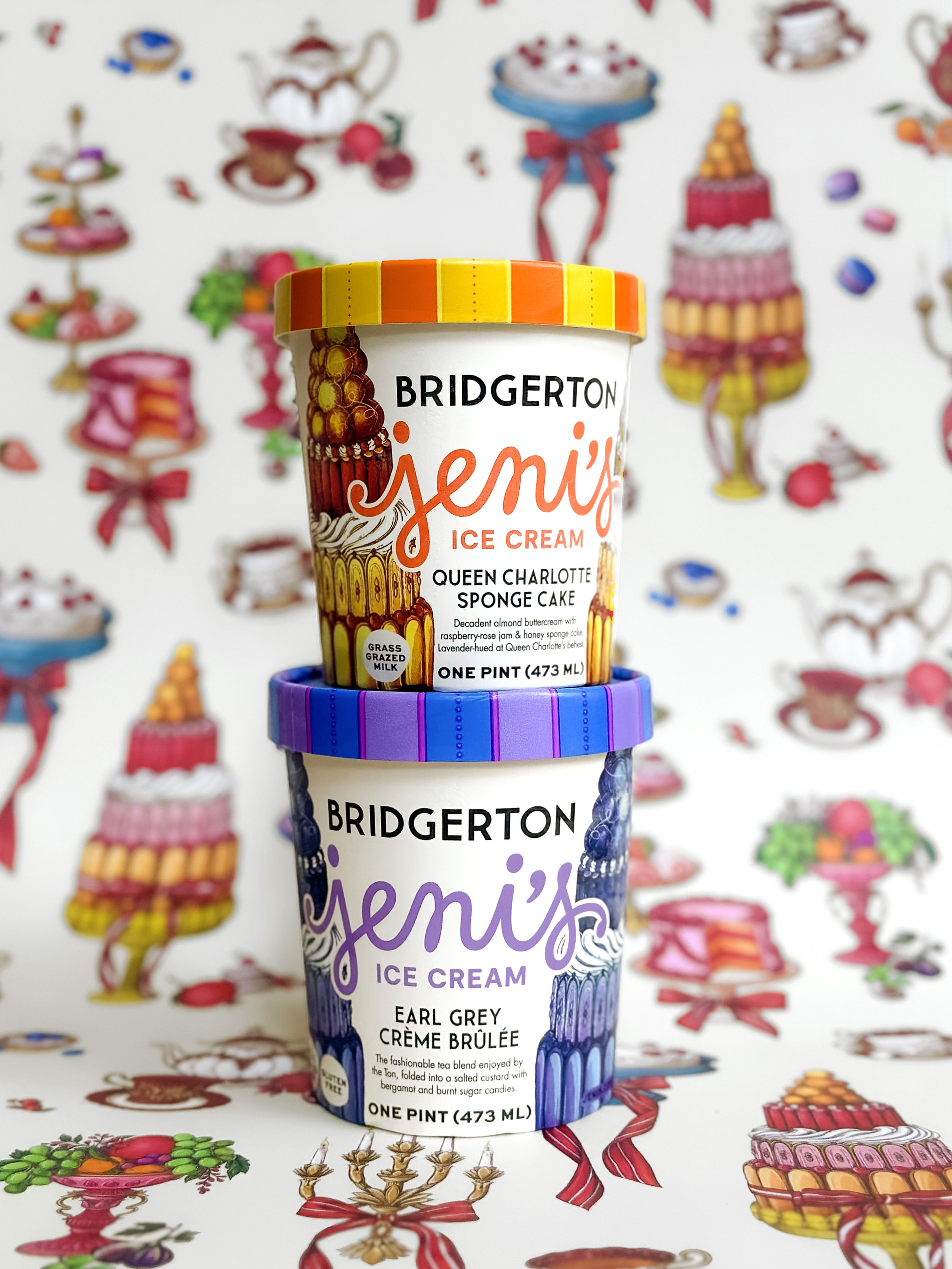 Jeni's x Bridgerton limited-edition ice cream collaboration with food illustrations by Maggie Enterrios, two pints of ice cream stacked in front of colorful illustrated background featuring desserts and tea party iconography