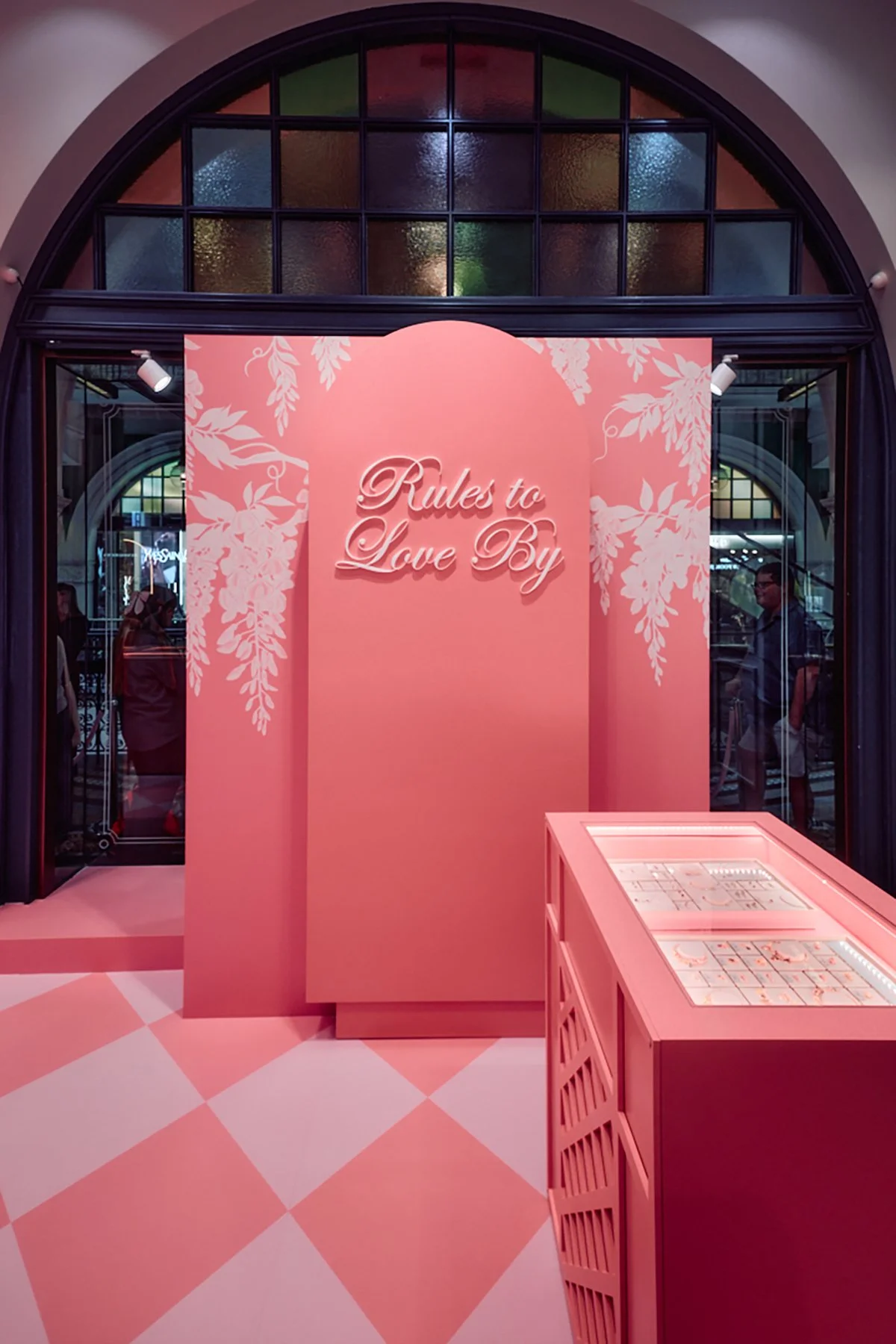 image of retail pop-up display with illustrated wisteria for Pandora x Bridgerton limited edition collaboration
