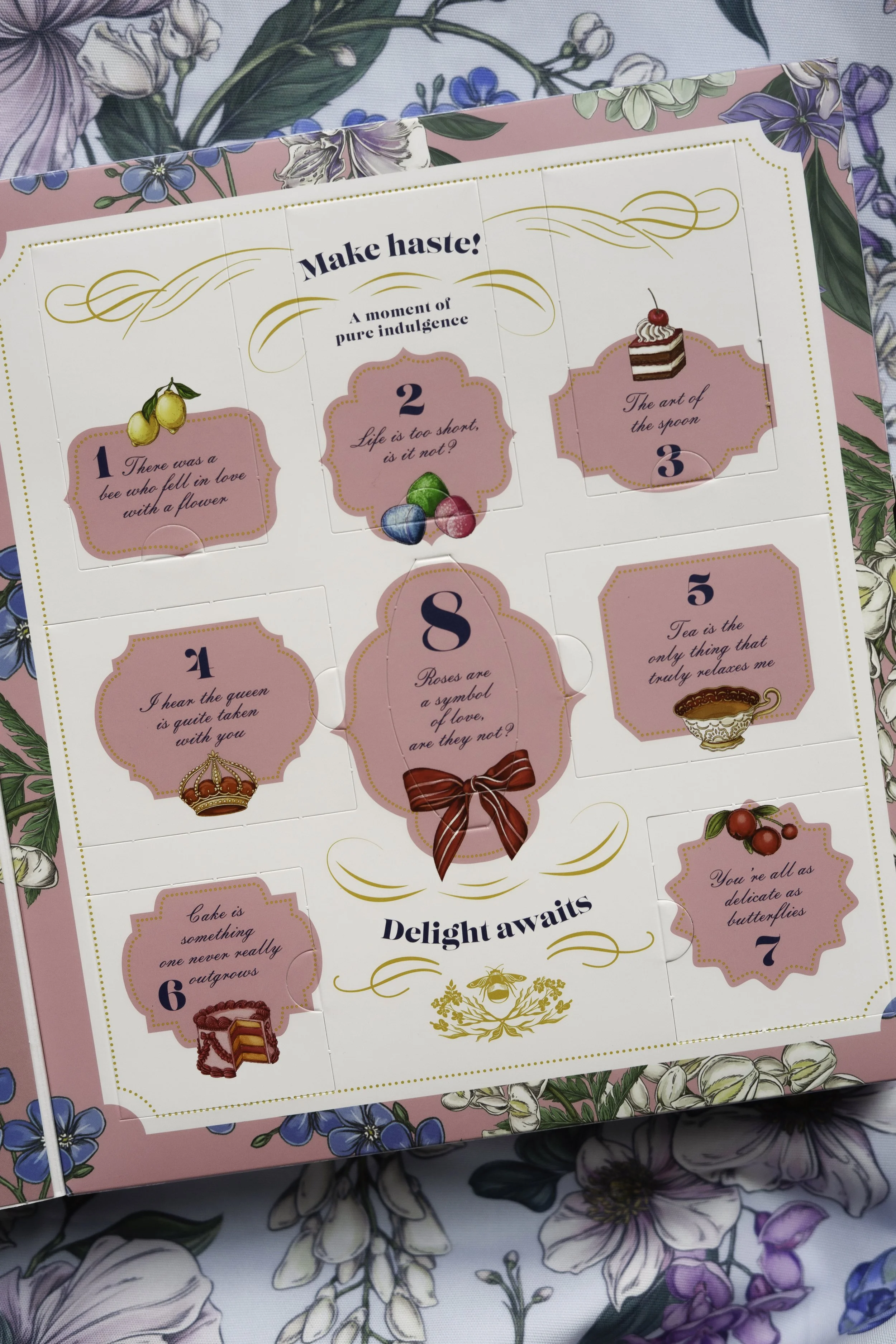 Detail of illustrated interior panels by Maggie Enterrios inside the Williams Sonoma Bridgerton Sweet Delights advent calendar