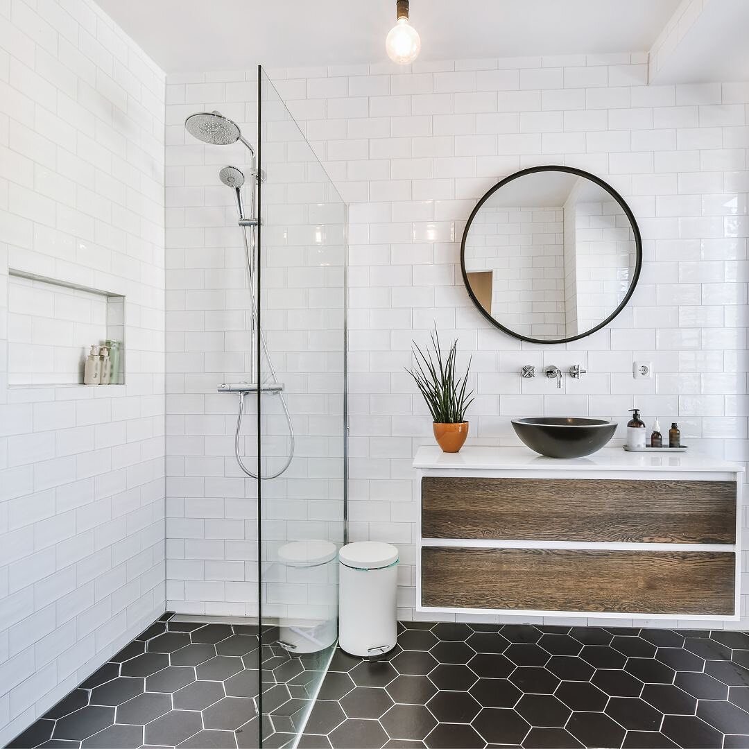TRENDING TUESDAY

One of the trends you will see more of in 2023 is curbless showers with continuous flooring in bathrooms. Curbless showers have been a thing for a while now. More recently though you see running tile etc through the entire bathroom 