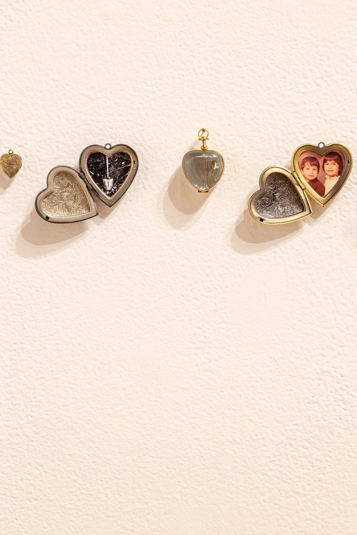 Marked at Form+Content Gallery, heart-shaped lockets detail. Photo by Christopher Selleck.
