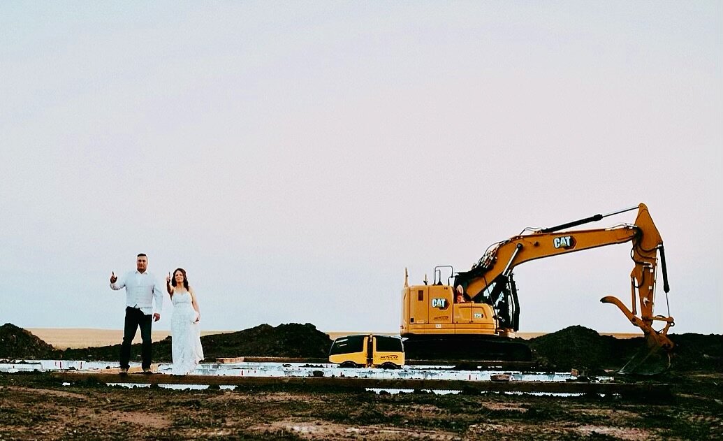 Our clients wanted a wedding photo in front of their future custom home so that&rsquo;s what they got. 🥂to the happy couple!