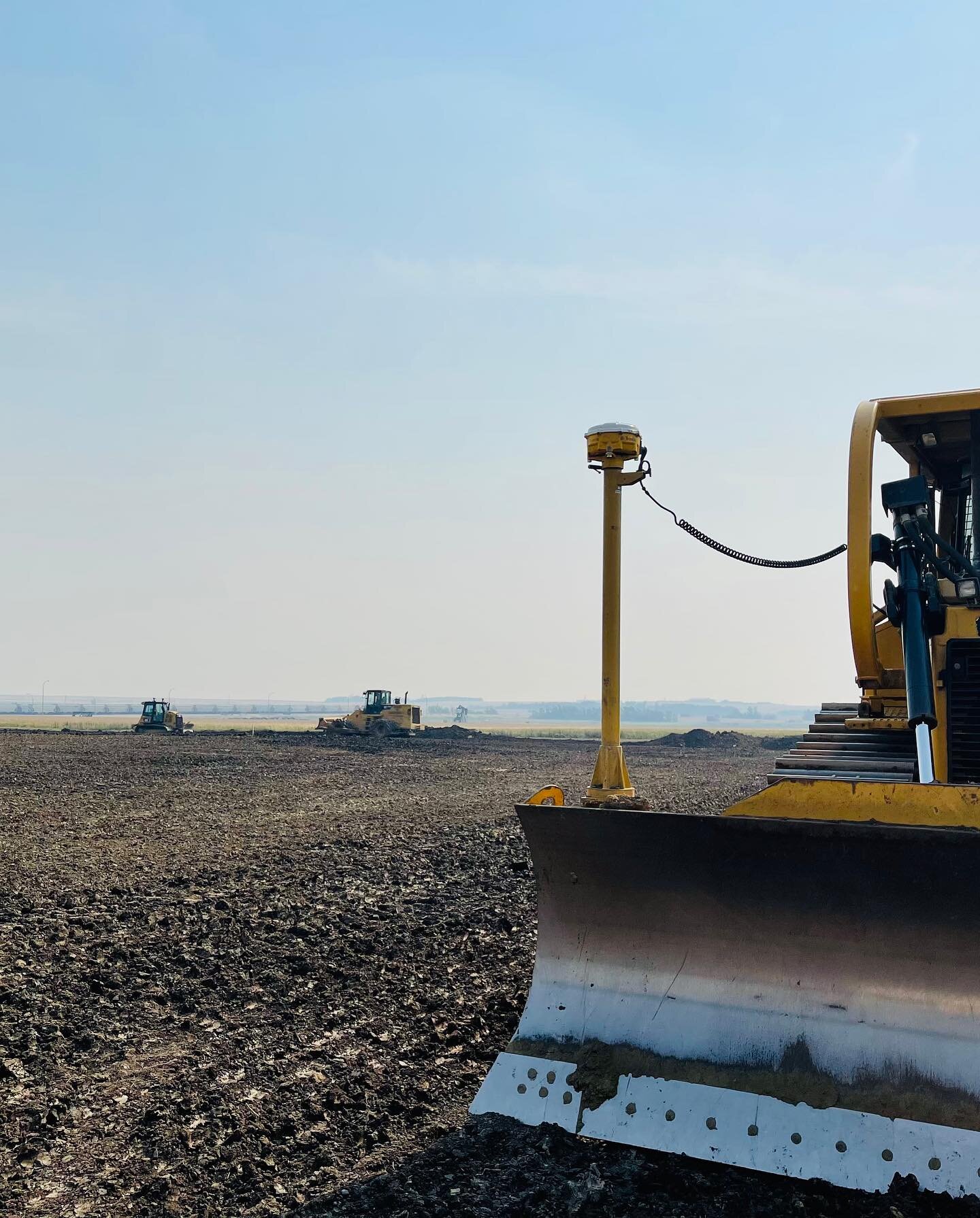 Moving dirt and laying down aggregates on another 5 acre commercial property for Solution Services new support building.