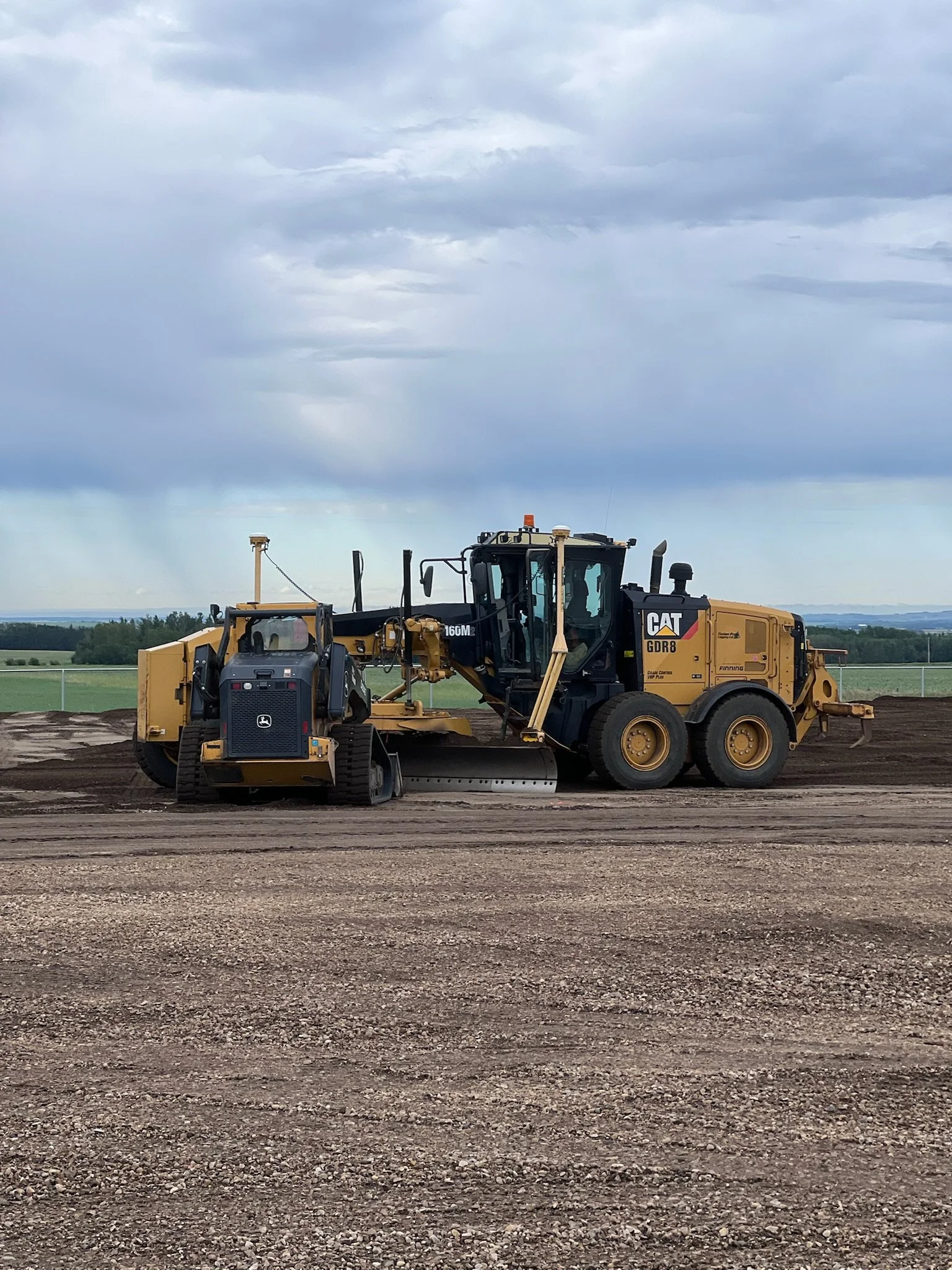 Great progress on site this week! We just finished dirt works.  They wraped up nicely with the grading and compaction teams putting the final touches on the pad.
The roller and grader have done an outstanding job preparing everything.
Next week bring