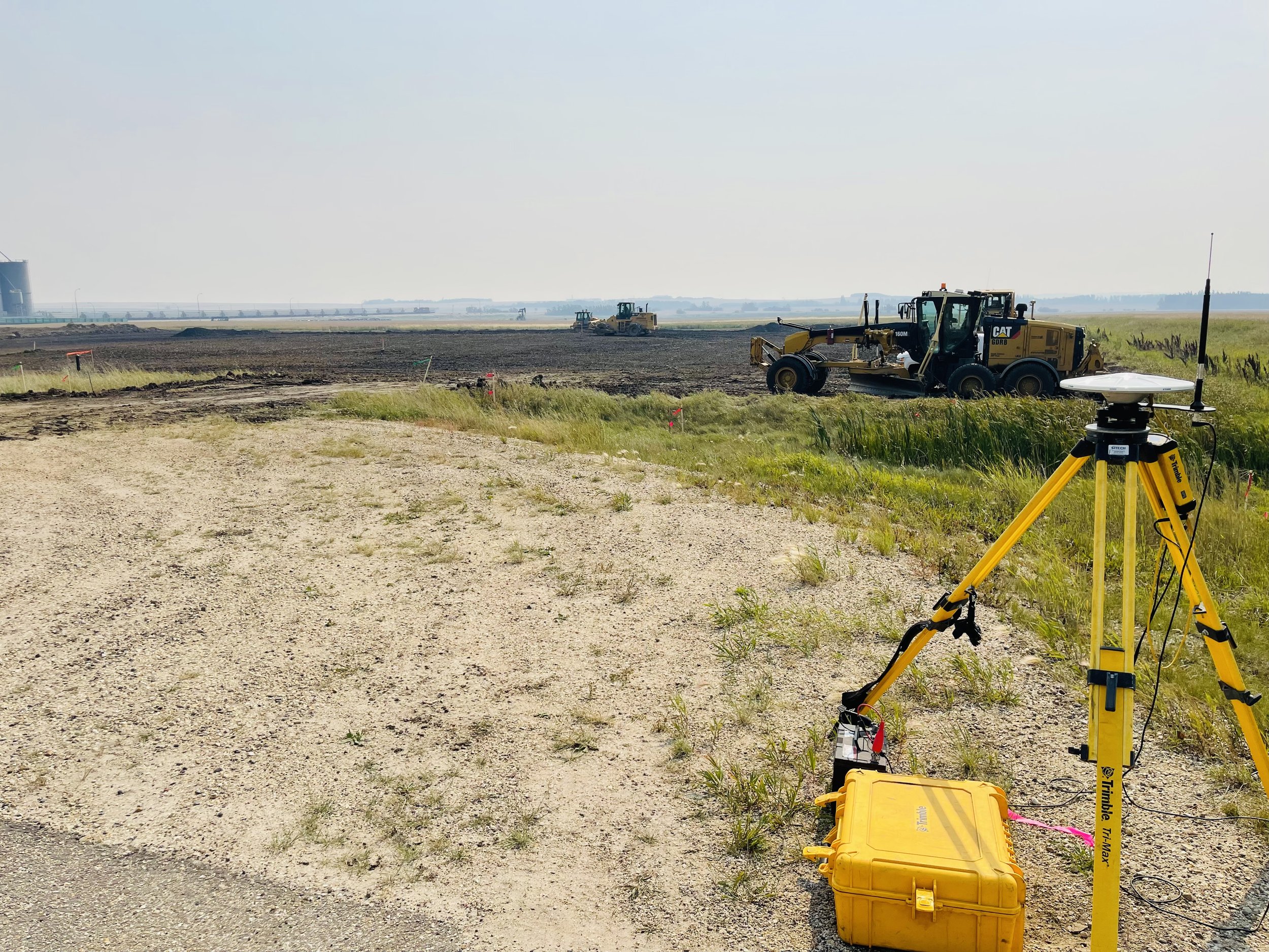 GPS setup for site preparation and grading at a new design build commercial site by Blackrock Homes & Commercial in Grande Prairie, Alberta