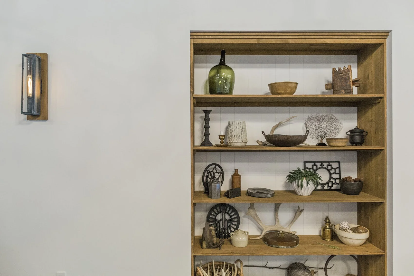 Custom built-in shelving in a Grande Prairie custom home builder farmhouse