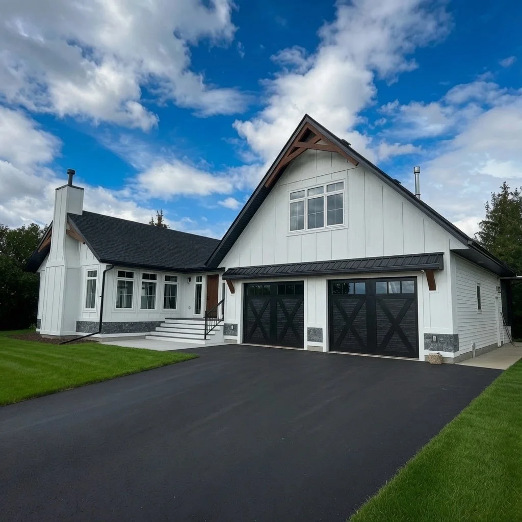 Custom home white farmhouse front exterior with attached garage and driveway