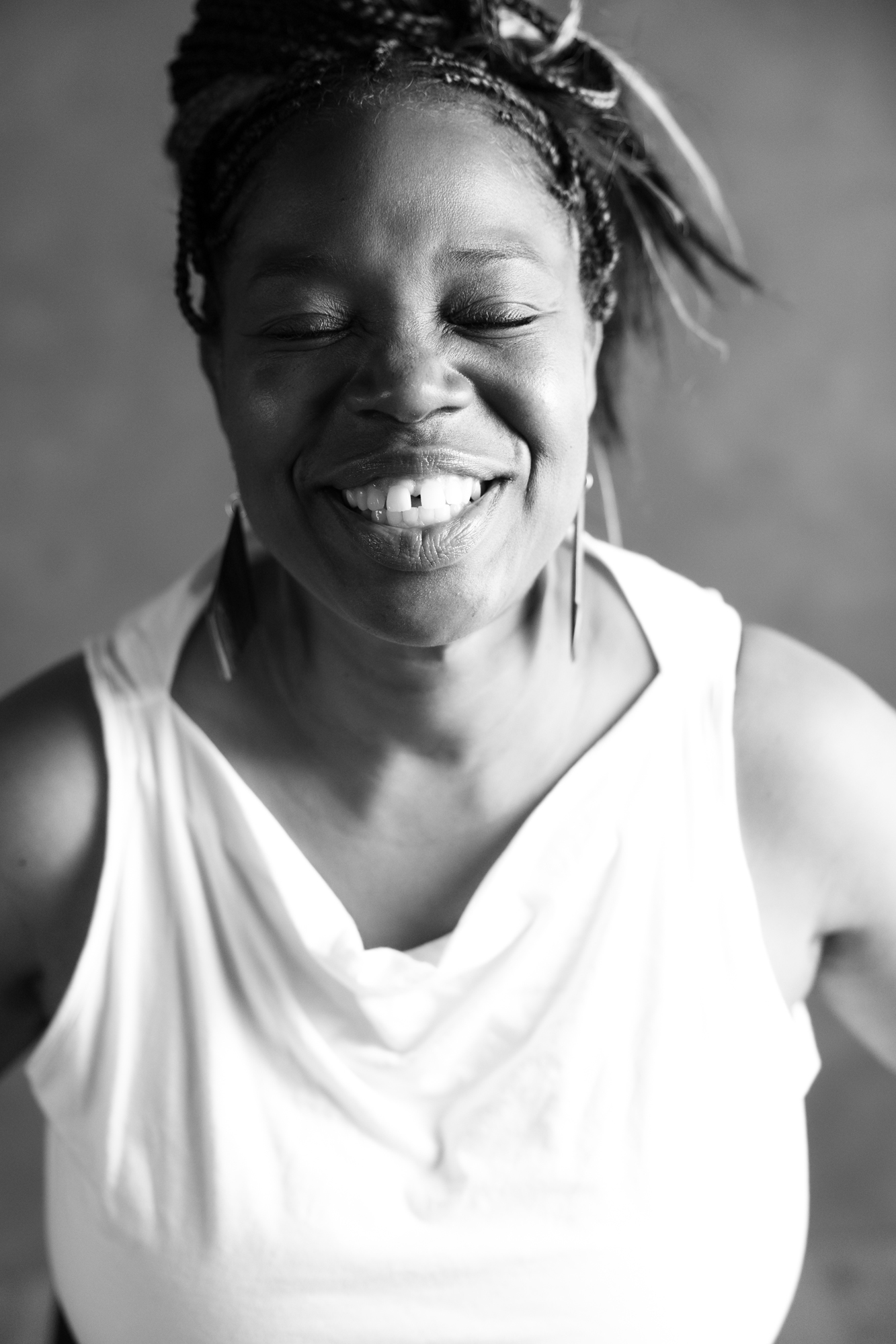 Soulful black and white portrait of a woman, present and very happy with a beautiful smile in san luis obispo county ca.