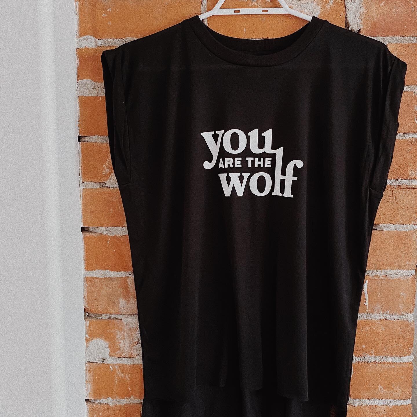 New product alert!!!! Check out these soft and super comfy women&rsquo;s rolled cuff muscle tees with the classic You are the Wolf logo! Screen printed by our friends @matte_black_studio_yyc, this might be one you want to wear daily!