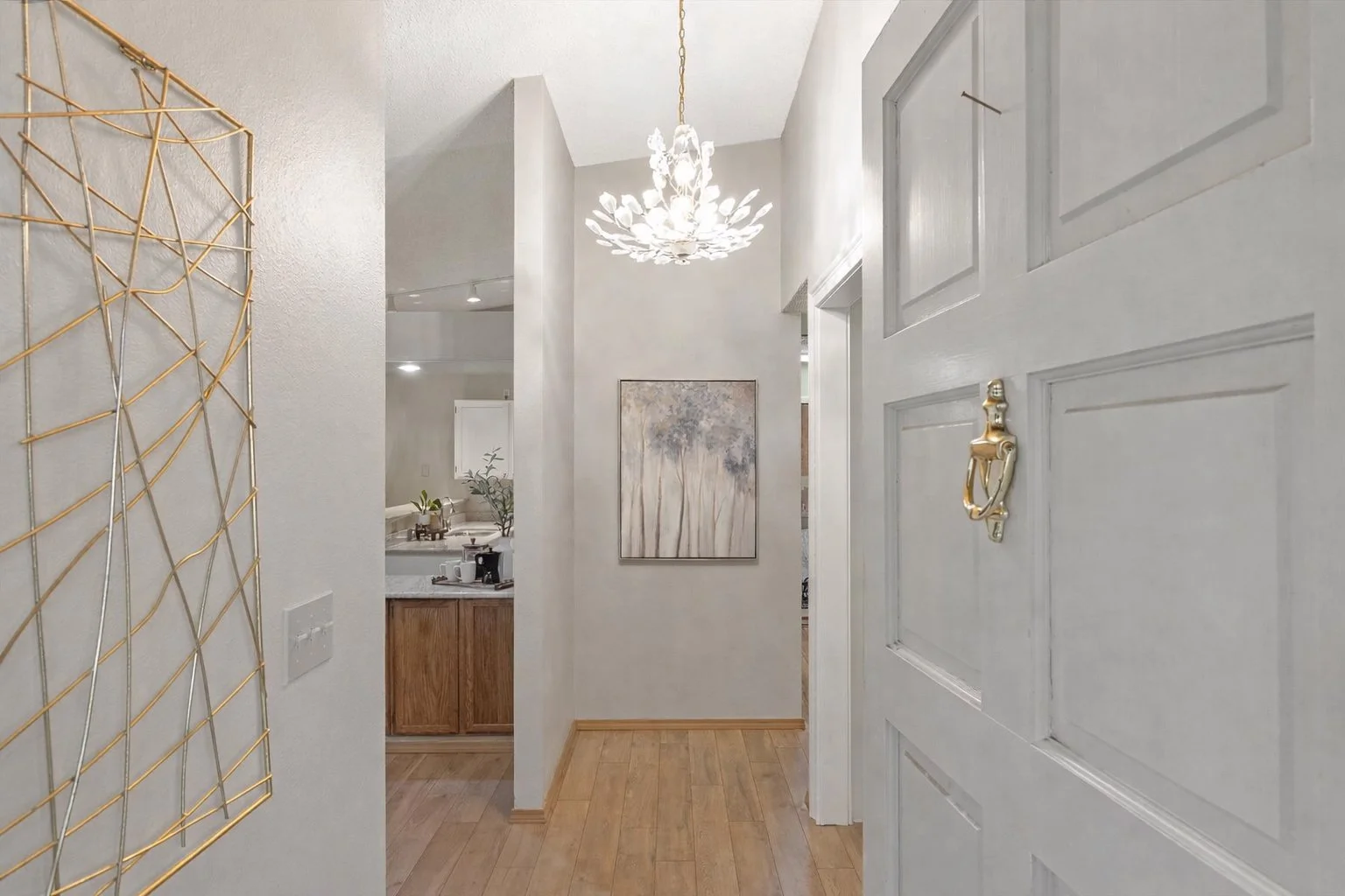 Elegant entryway with golden accents.jpg