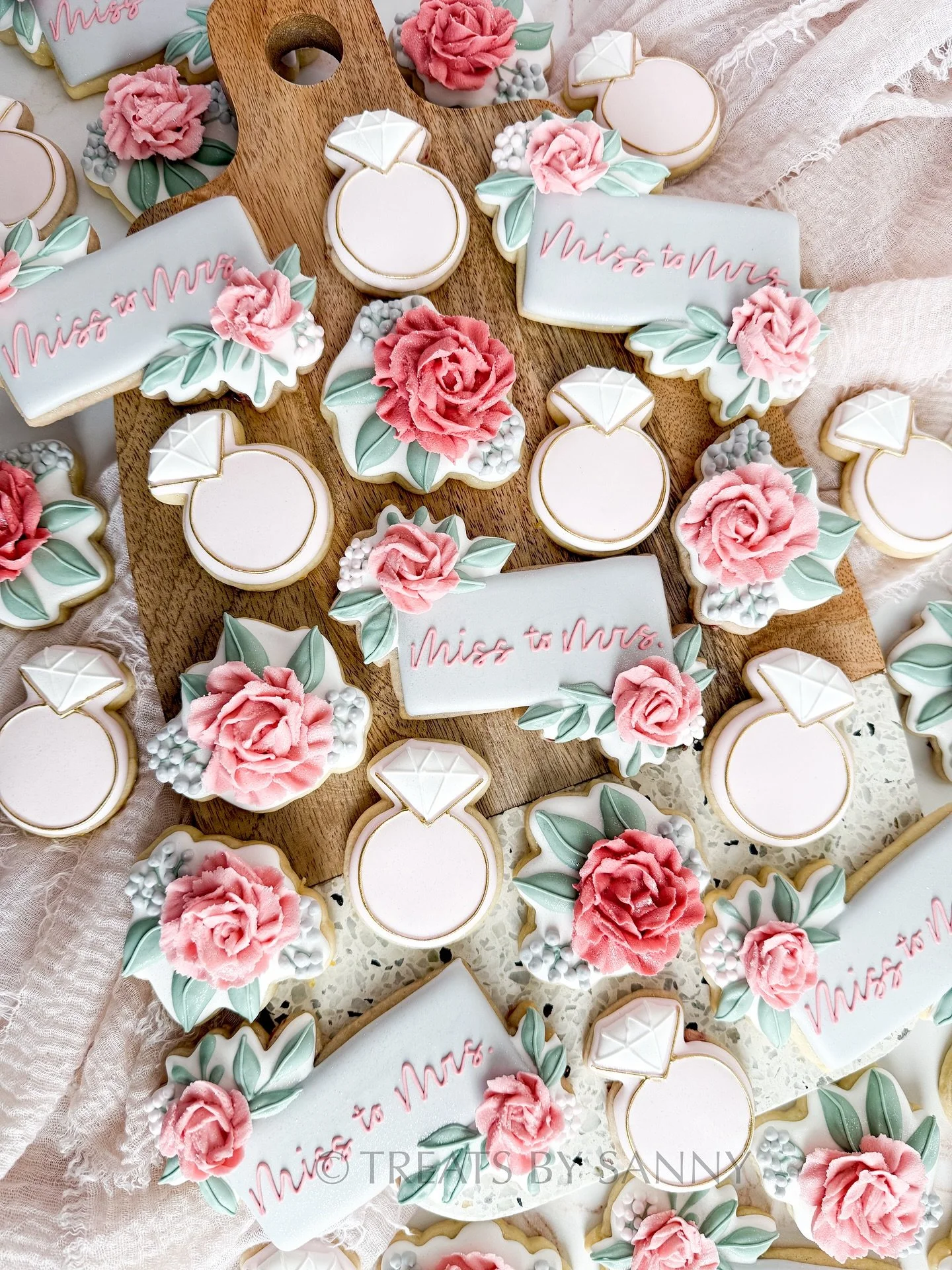 A very floral bridal shower! 🩷💍 I haven’t piped this many roses in a while, stay tuned for even more in the full set! 🤗 
Using @g.g.cakraft floral piping tip GG101 and GG102 which can be found through @bloomsbyjune ‘s shop - use code