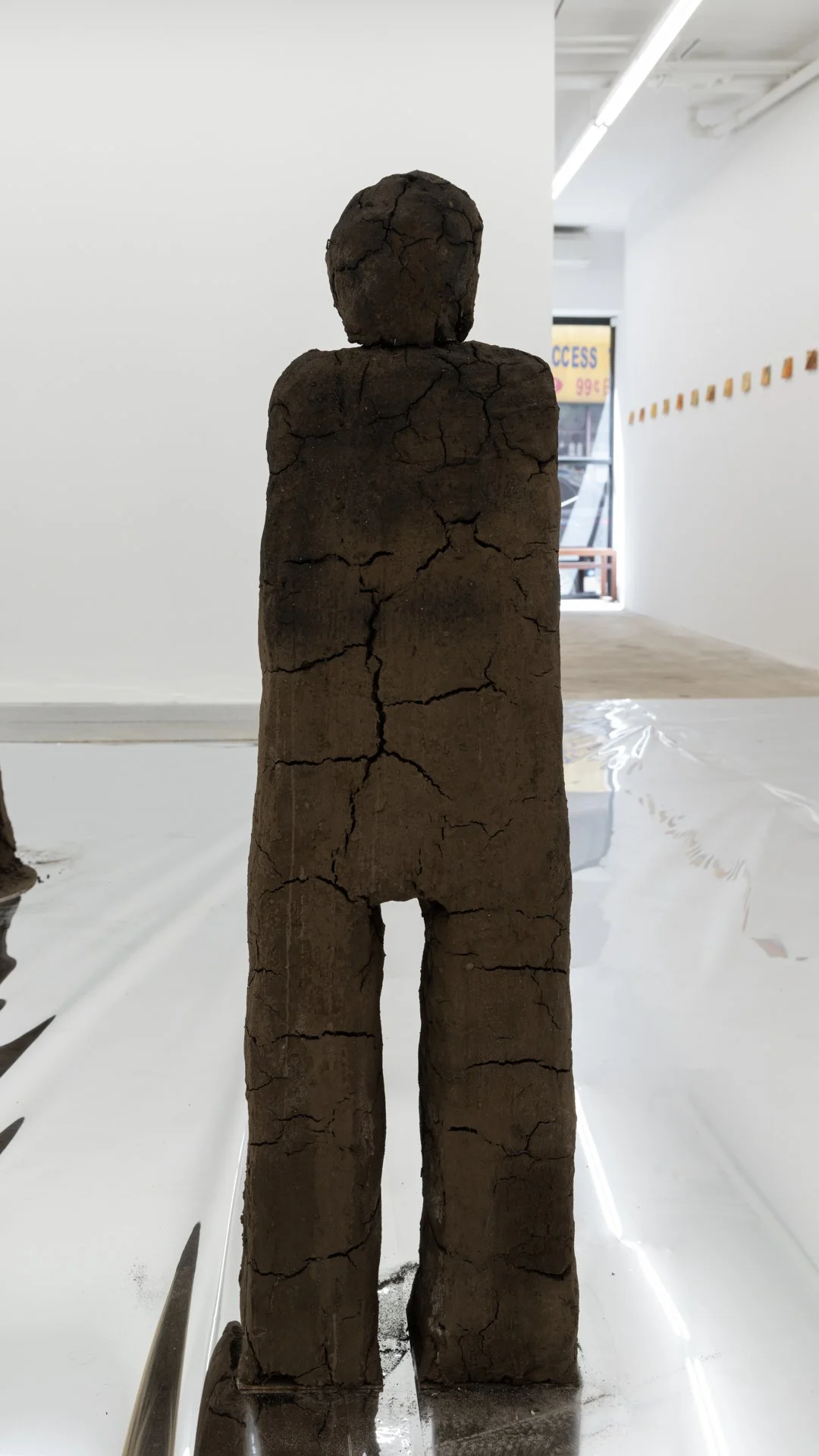 Kiyan Williams,  Sentient Ruin 5 , 2022
earth, binder, steel base and armature, 42 1/2 x 12 1/2 x 6 1/2 inches, 108 x 31.8 x 16.5 cm