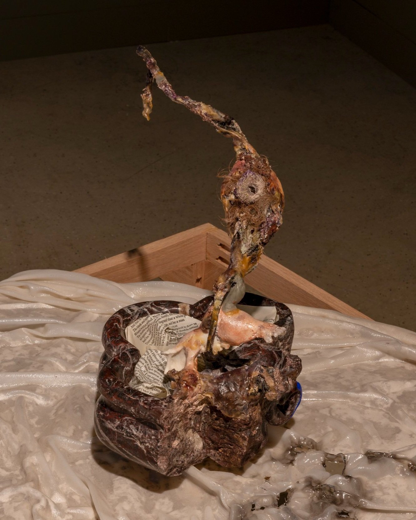  font IX , 2022, Found marble font (18th century, French), horse sacrum, plaster, epoxy clay, beeswax, paper pulp, poplar, destroyed Cathay (Ezra Pound, centennial edition), 10 x 13 x 10 inches