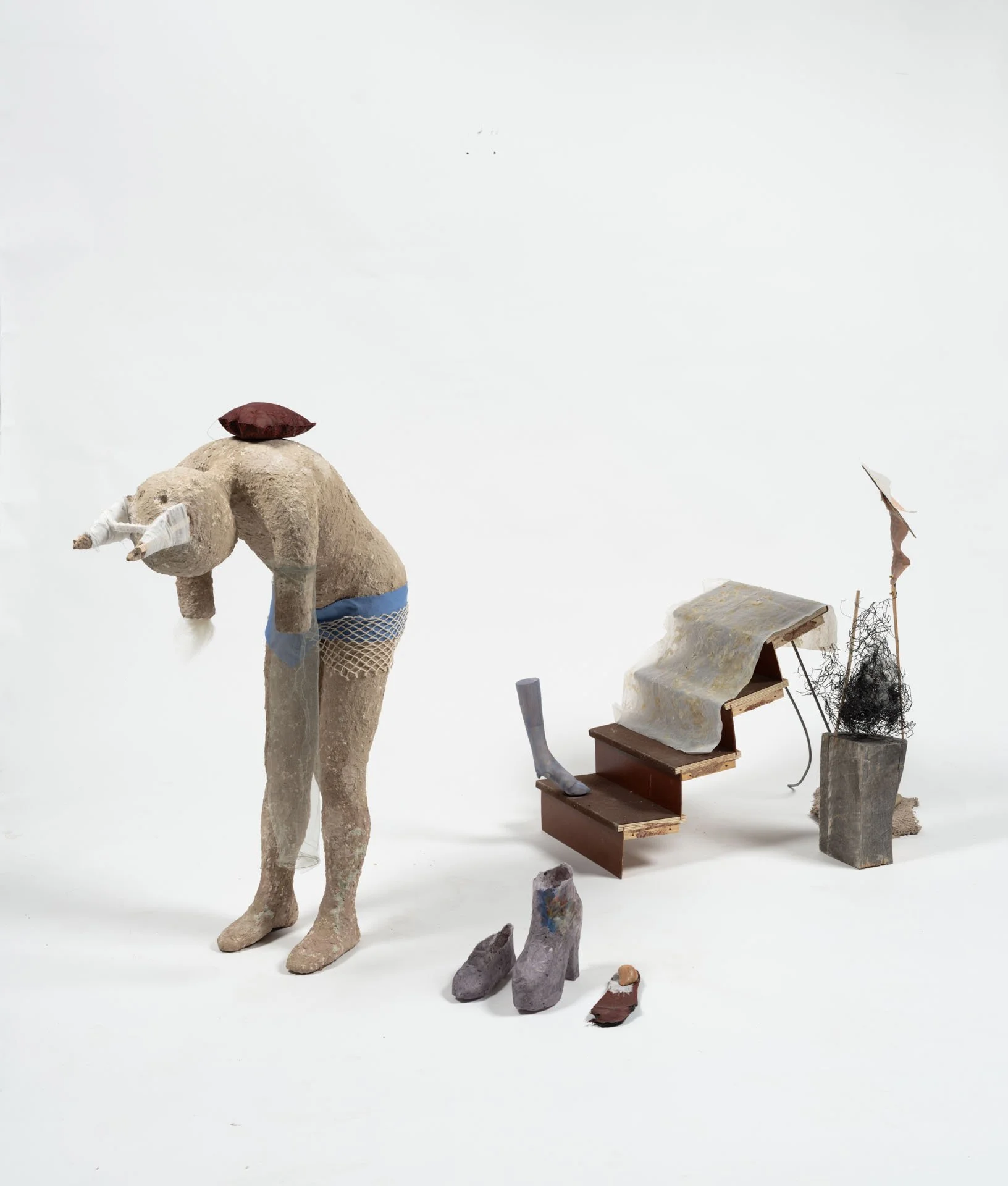 Catalina Ouyang
  syndrome , 2023
 Papier maché, textile, discarded elements, steel, brass, oil paint, paper, oak, pine, pet staircase, acrylic gel transfer, hardware, wire mesh, wool roving, plastic, and resin
 72 x 42 x 40 inches, 182.9 x 106.7 x 1