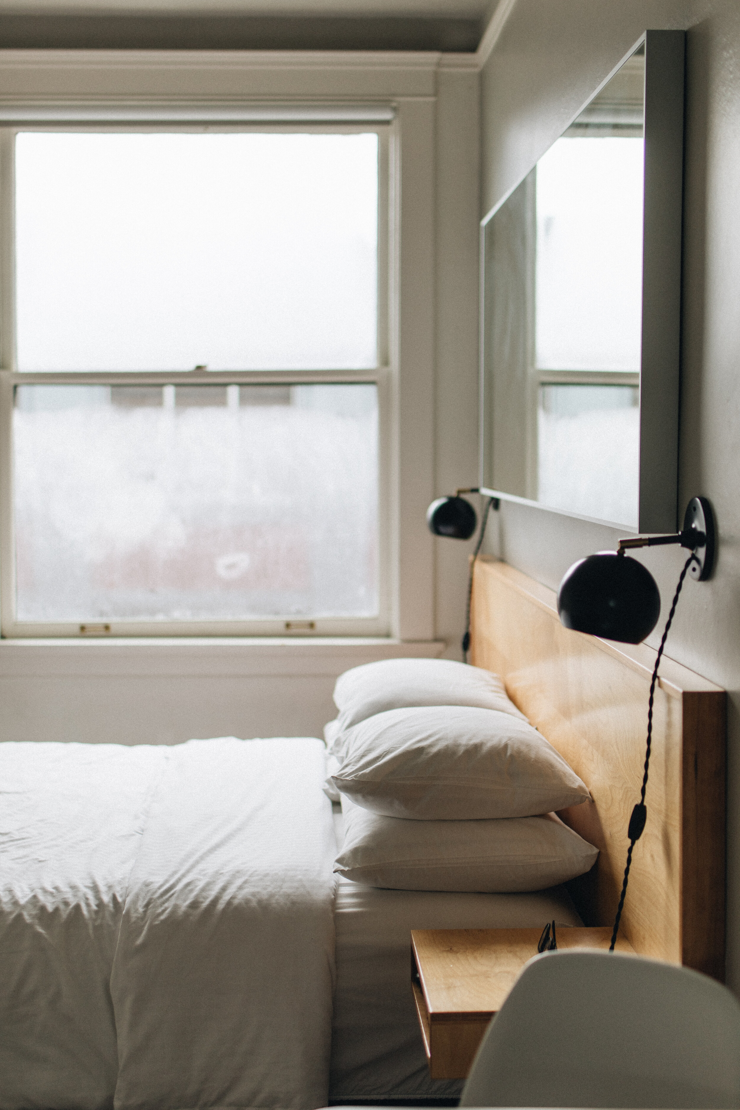 Norblad Boutique Hotel Astoria Oregon Custom Bed Frame Black Sconces Interior Design Photography