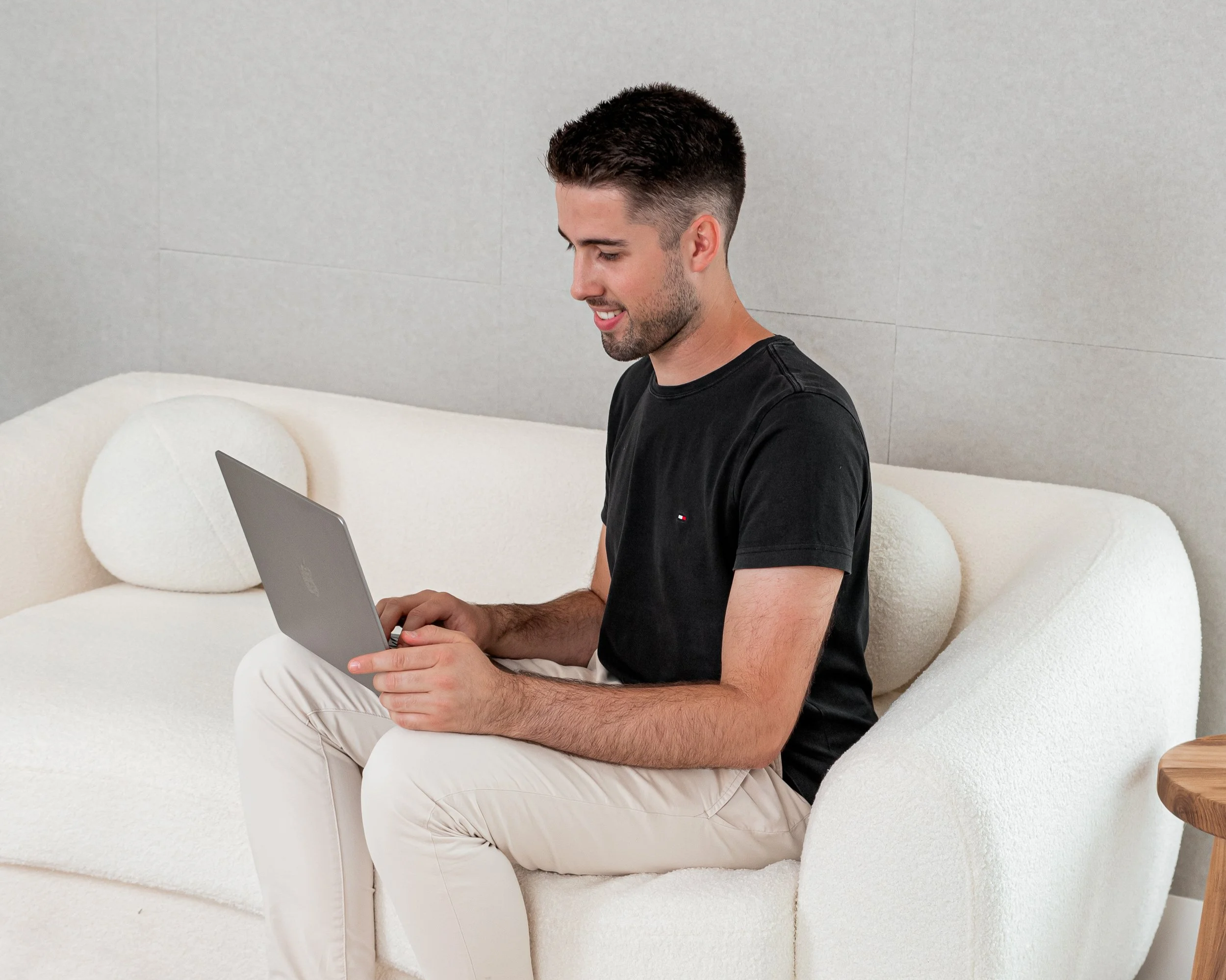 Port Macquarie website designer Thomas Craddock working on a laptop