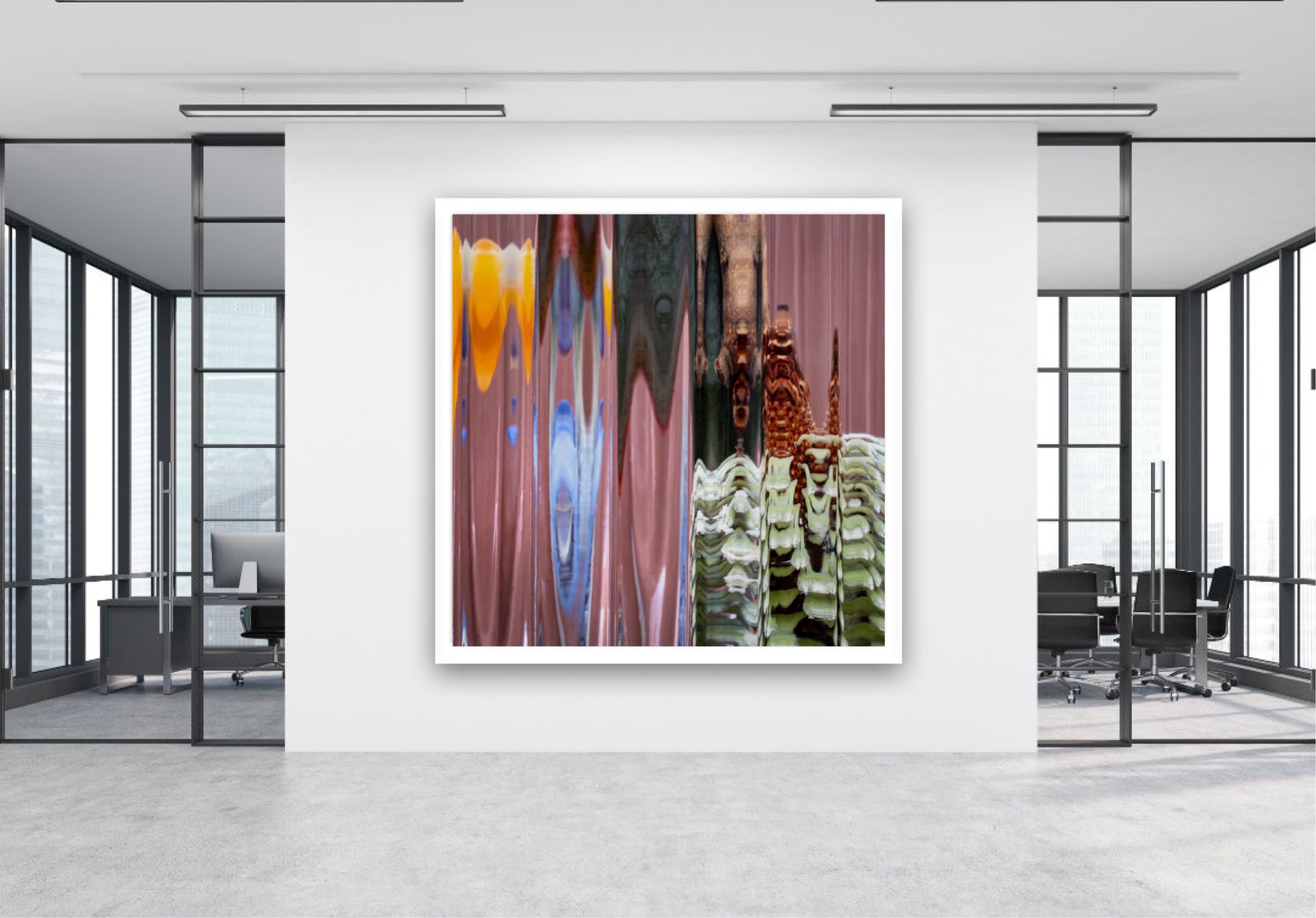 Modern art gallery with abstract colorful painting on a white wall, surrounded by glass walls and office furniture.