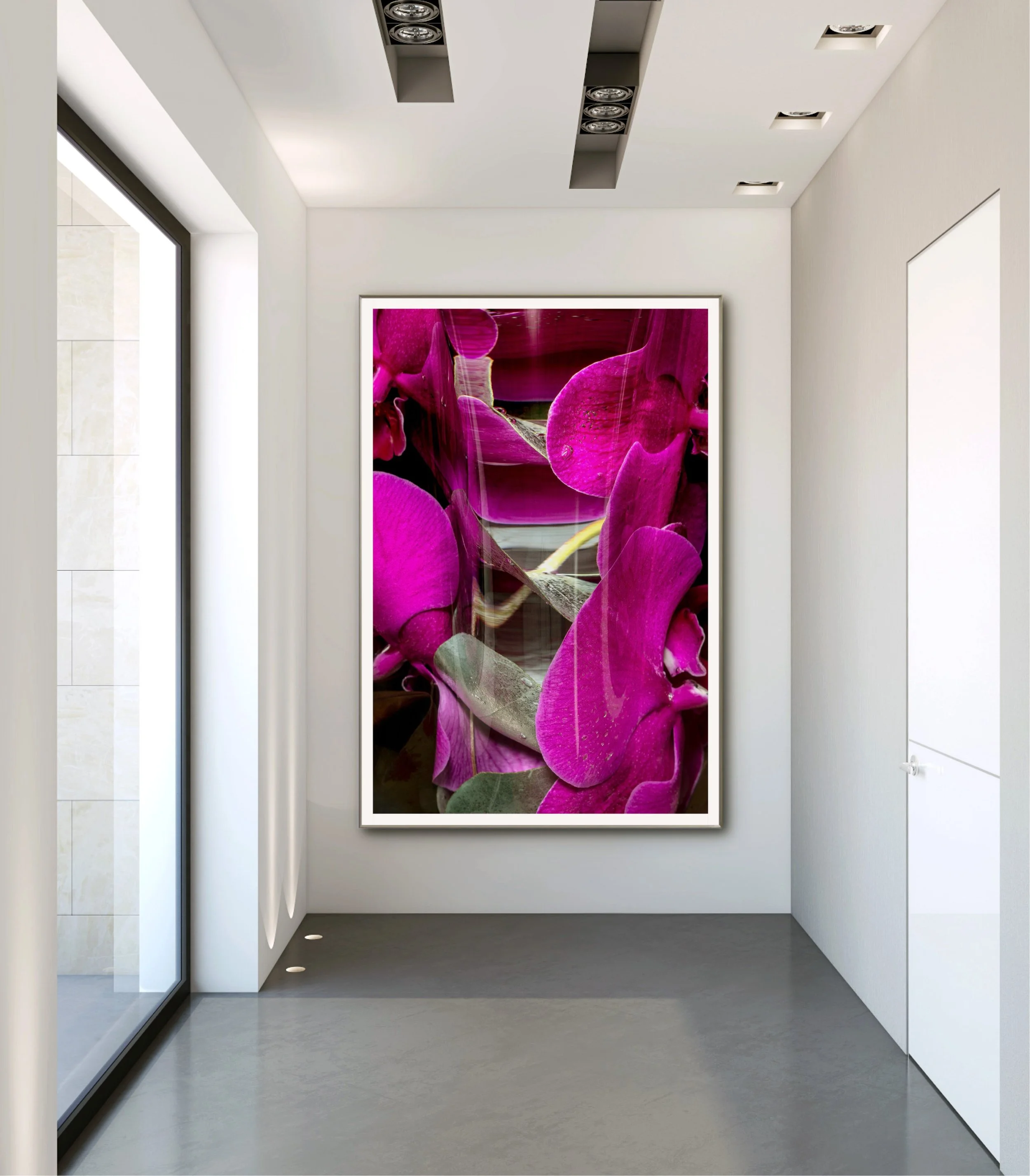 Gallery with a large framed image of pink orchids on the wall, next to a large window with natural light, in a modern, minimalist interior.