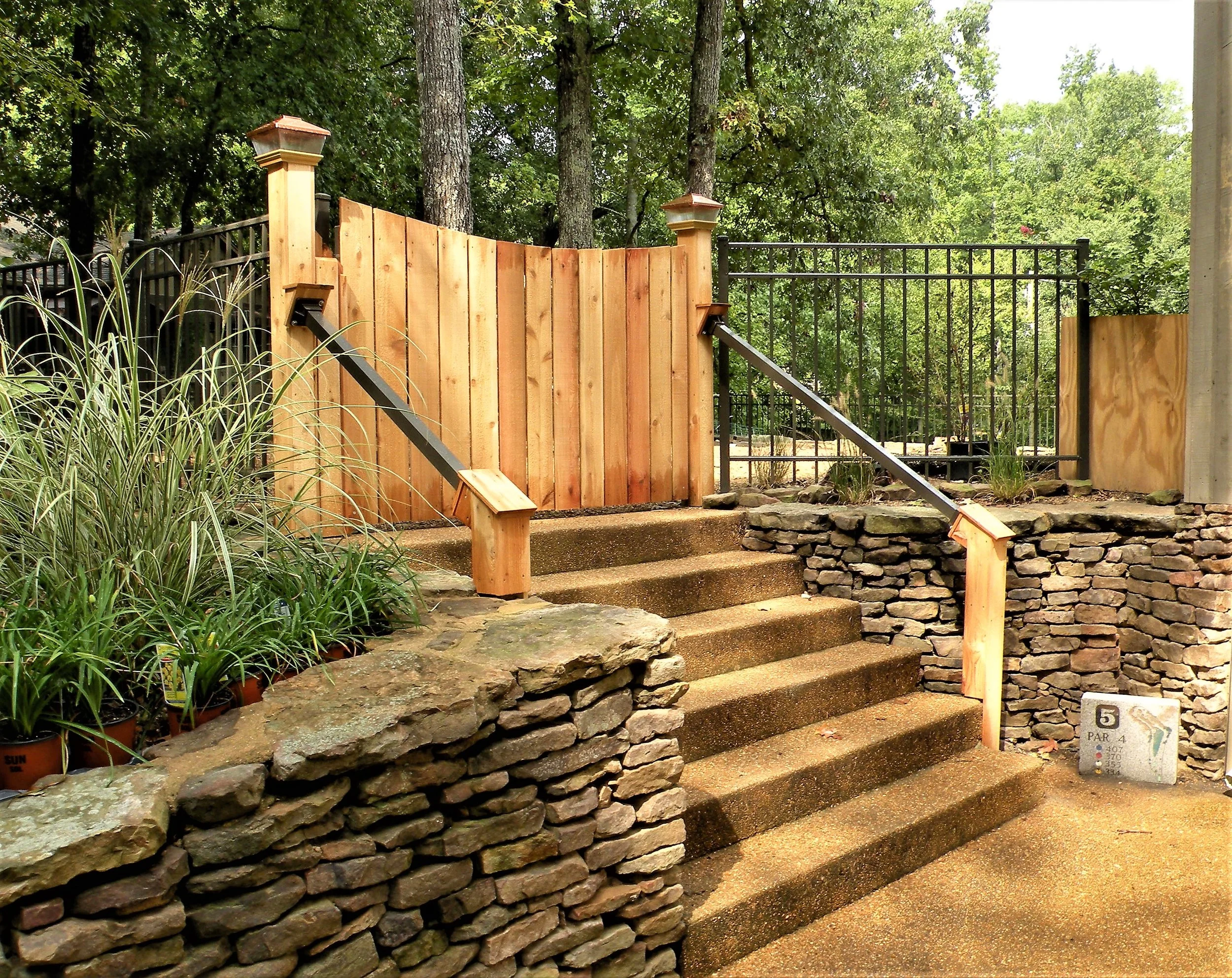 stone steps and cedar gate