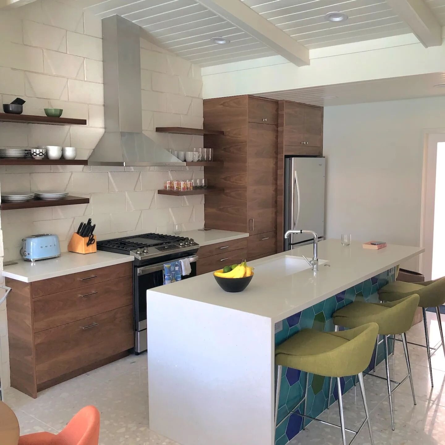When my former clients told me they purchased a Mid-century vacation condo in Palm Springs, CA and wanted me to help them re-imaging the space I was so excited!  They loved the existing unique block wall so I turned the Kitchen to turn it into the fo