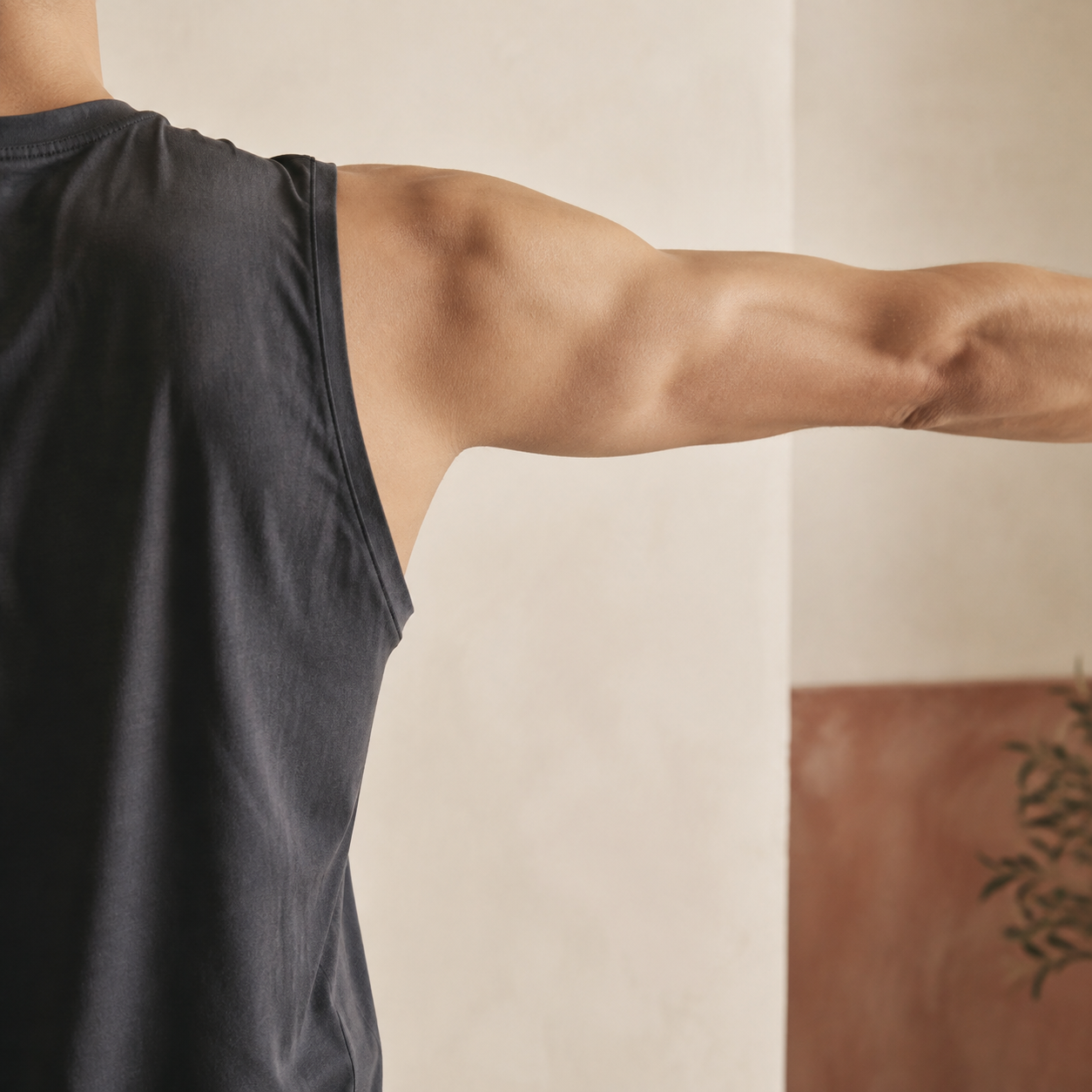 Close view of shoulder mobility in a private training studio.