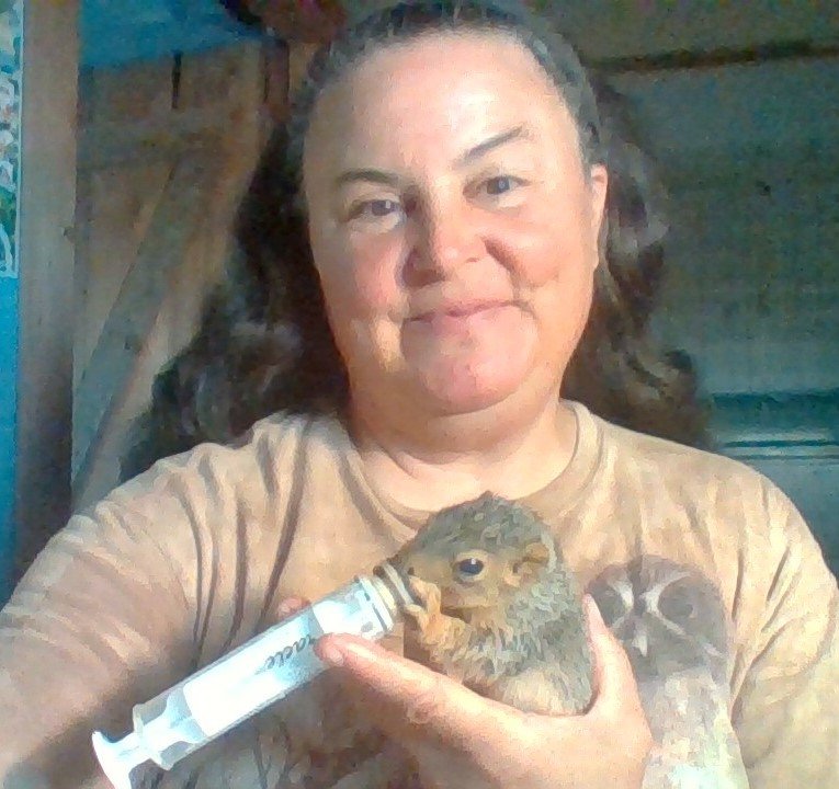 Author with baby squirrel