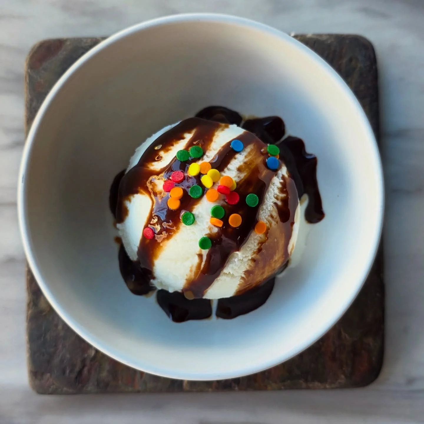 Kicking off Kids Eat Free this week - 5-7pm, Monday - Friday, bring the family in for dinner! Kids under 12 have a special menu (that ends with this ice cream, chocolate sauce, and sprinkles!) that is free with the purchase of an adult entree. See yo