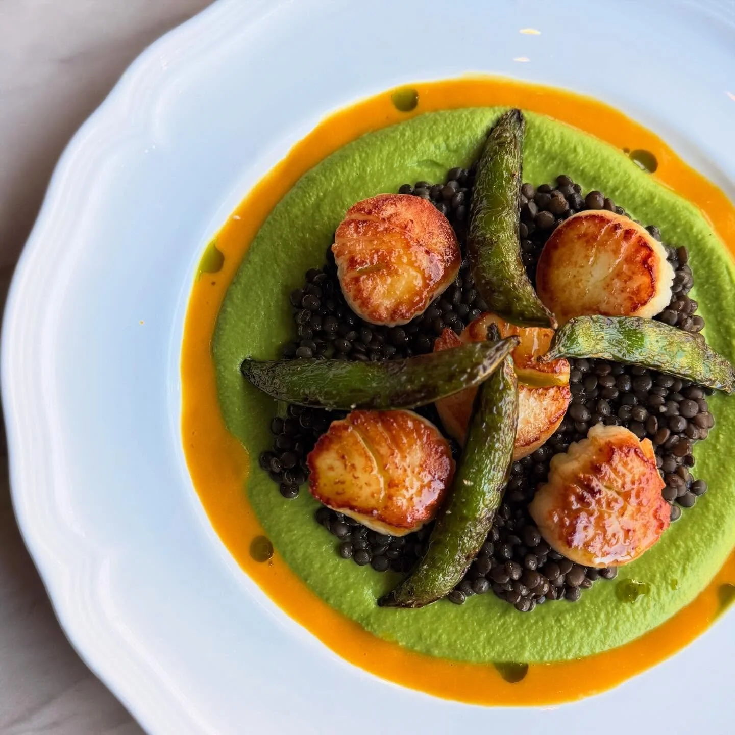 Diving into a plate of scallops because we made it to the weekend! See you at 5pm.