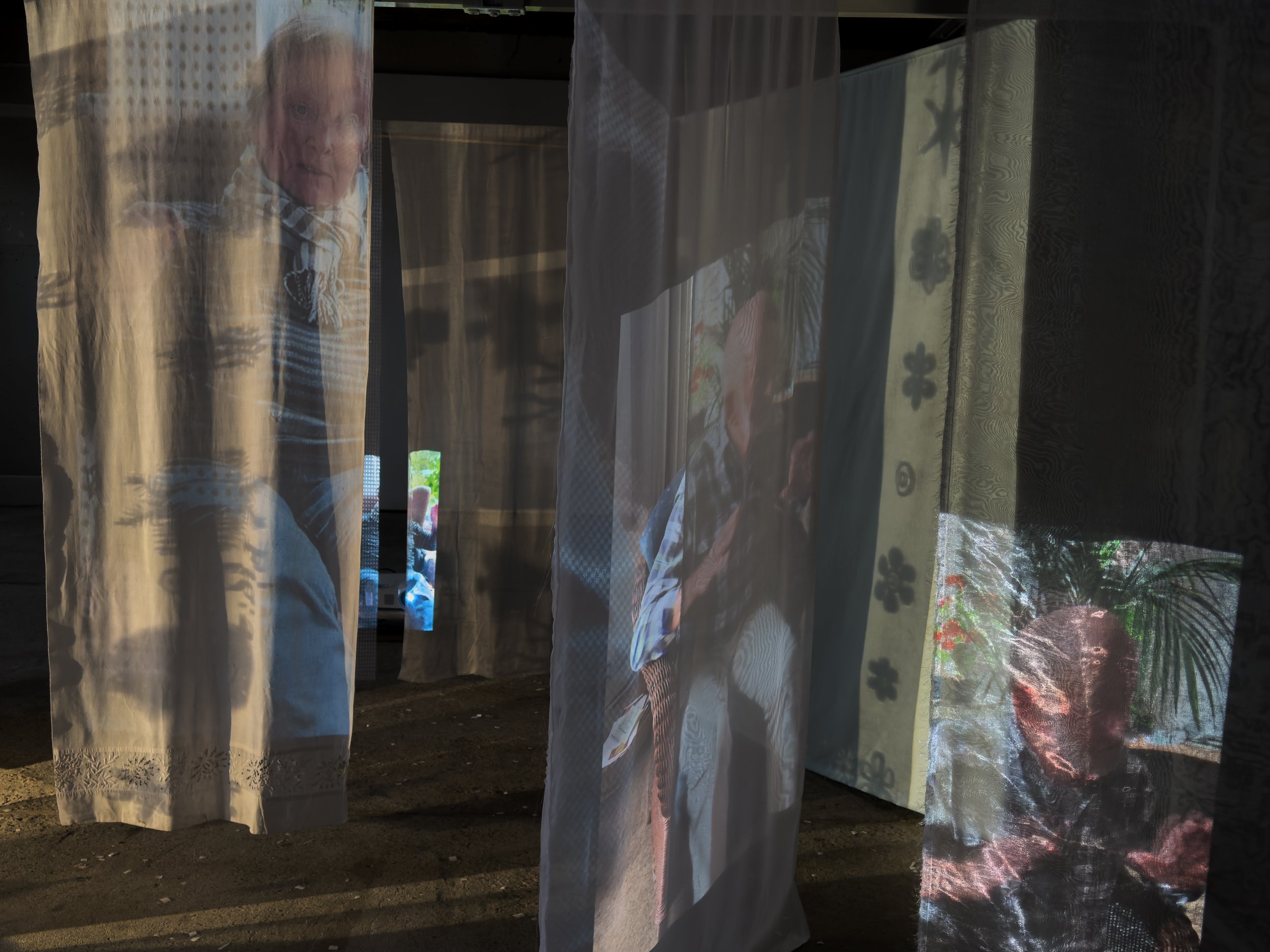  Detail of installation at the StadsGalerij; projected video, photography, audio, fabric, steel, and Foley sound. 