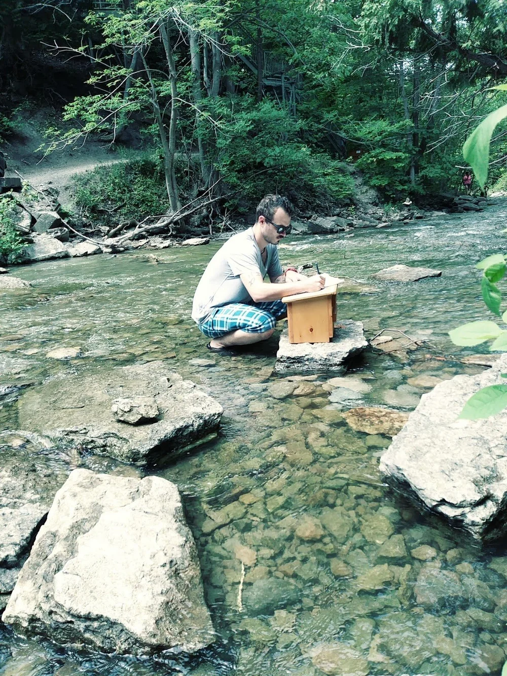 guy at poem box.jpeg