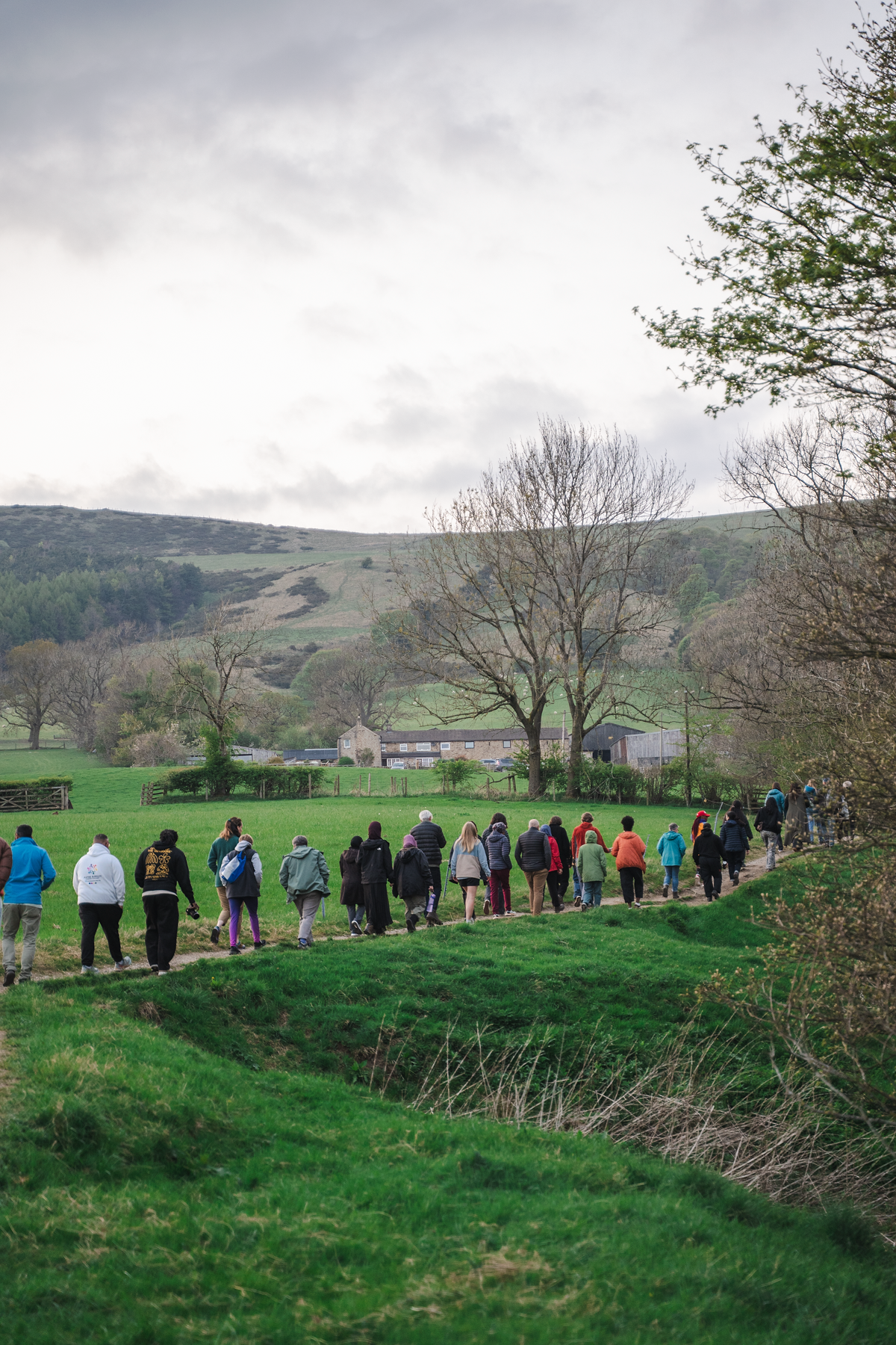 Event attendees head out from the YHA on a sunset walk