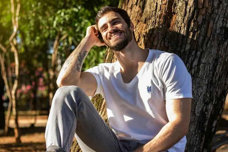 a man enjoying nature and smiling